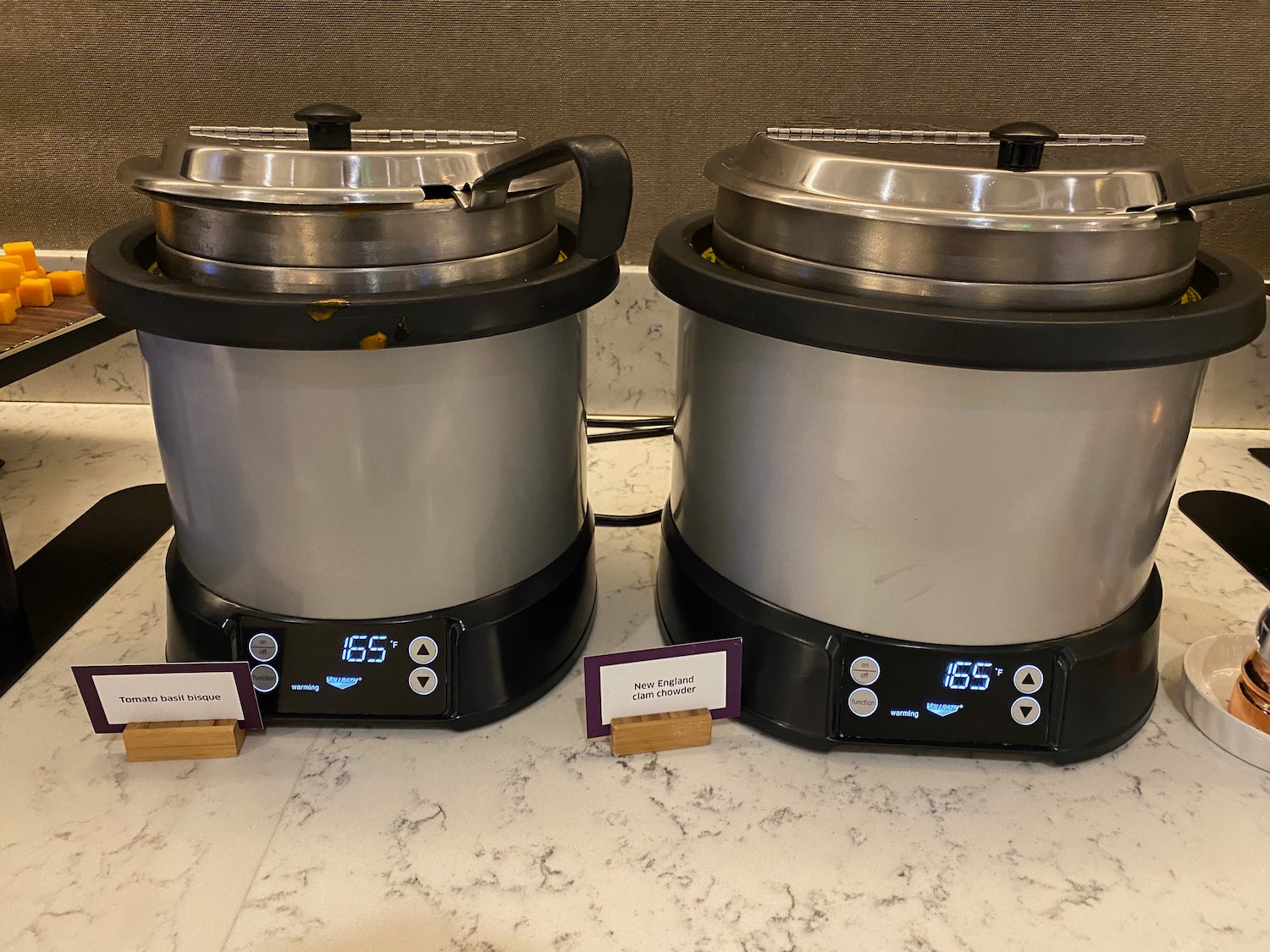 two large pots on a counter