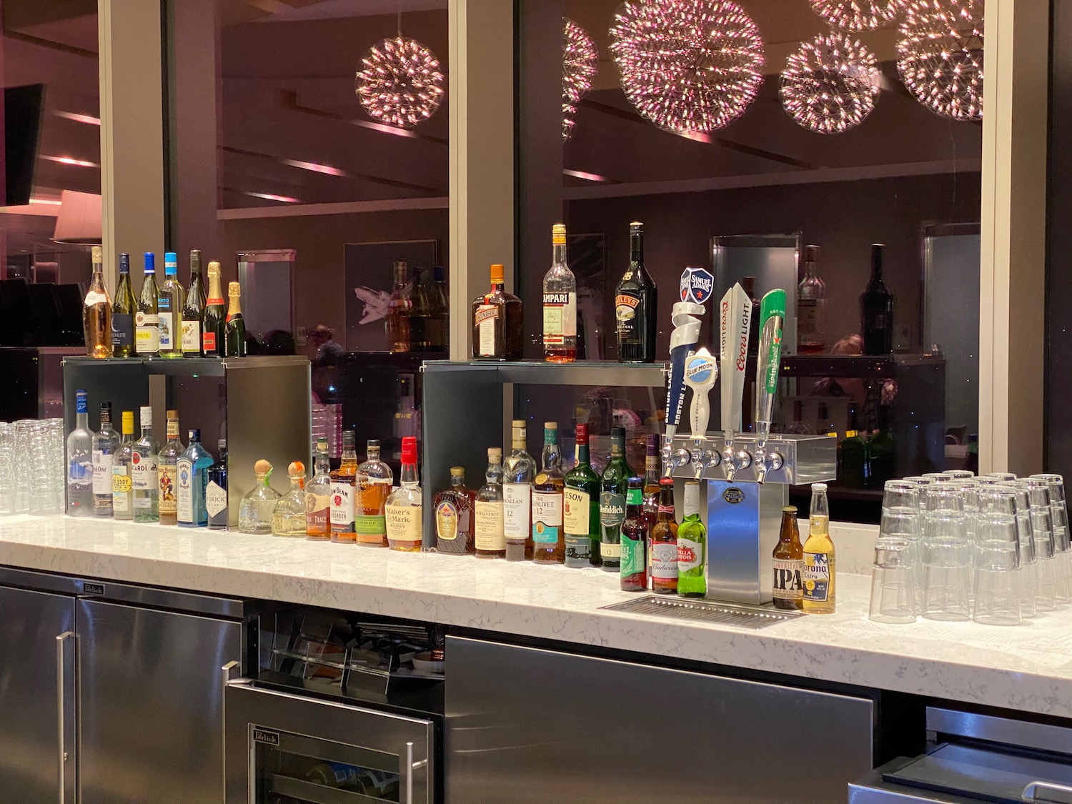 a bar with bottles of alcohol