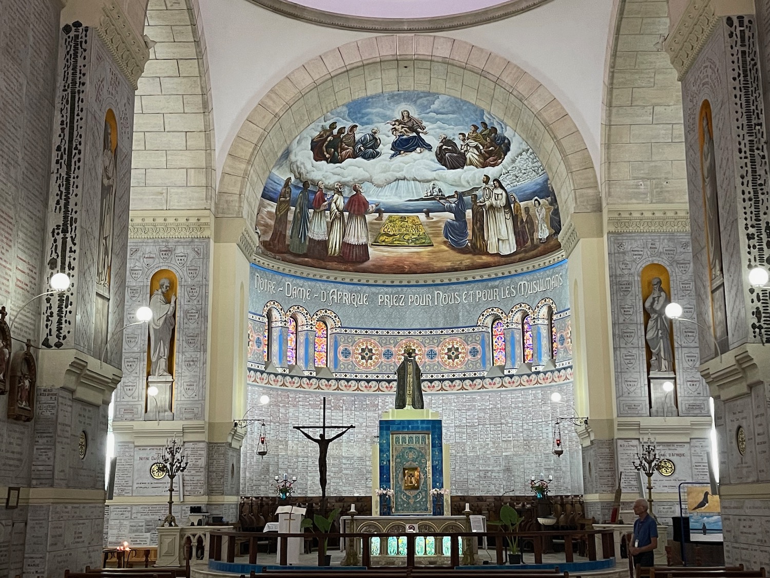 a large church with a mural on the wall