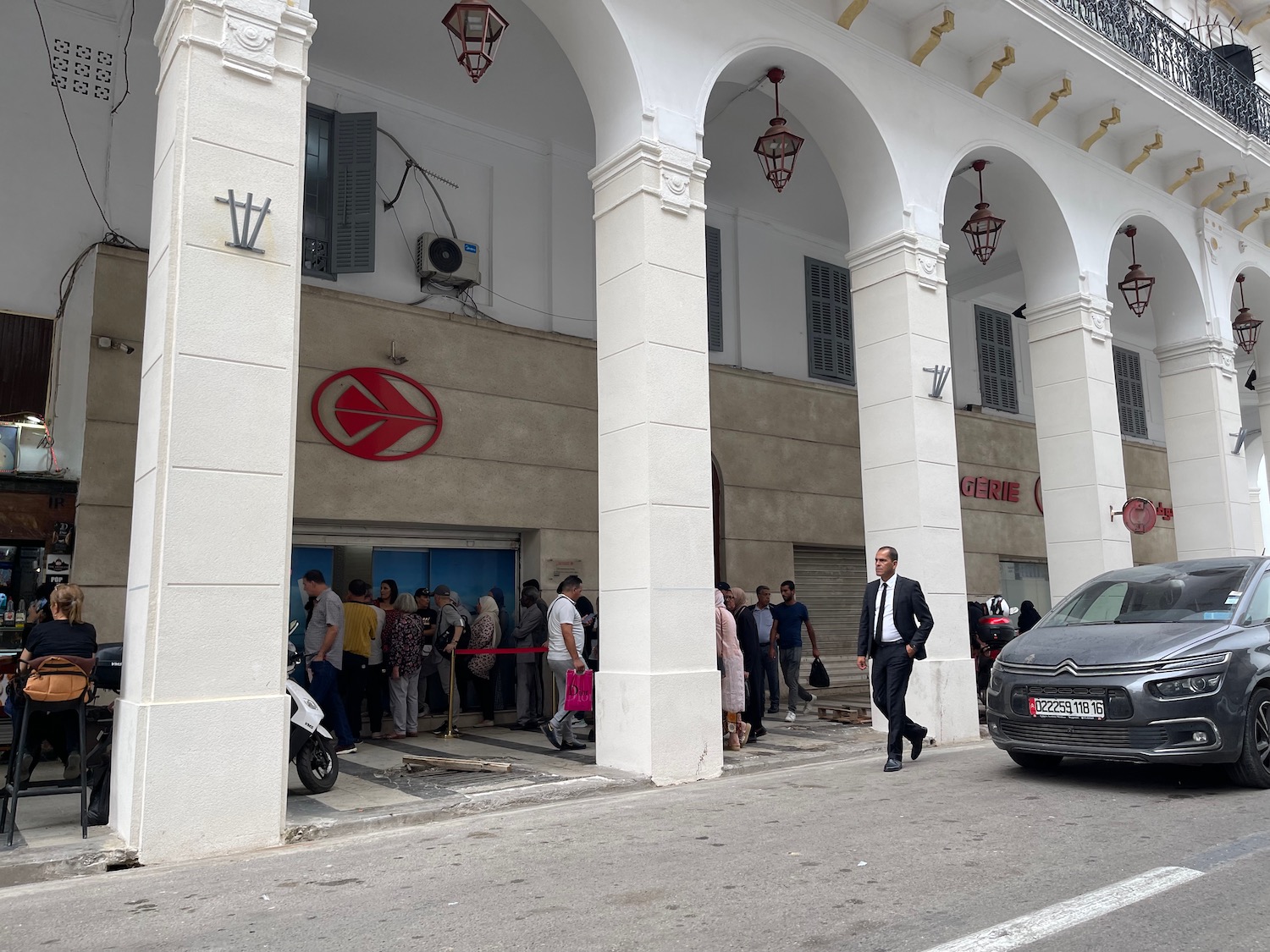 a group of people outside of a building