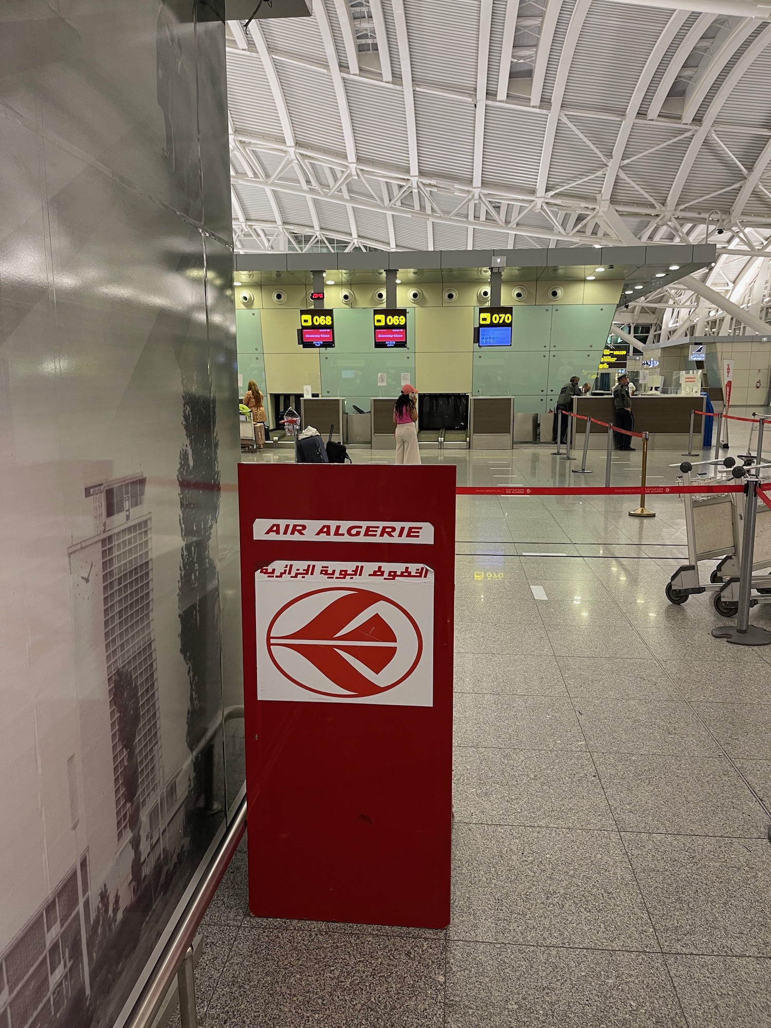 a red sign in a airport
