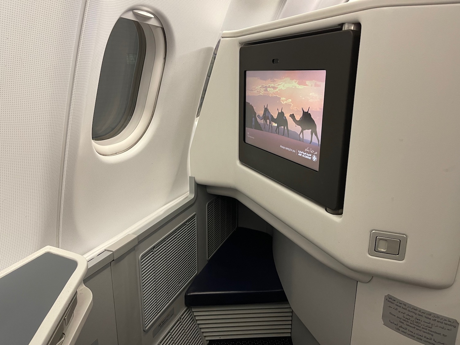 a tv on the wall of an airplane