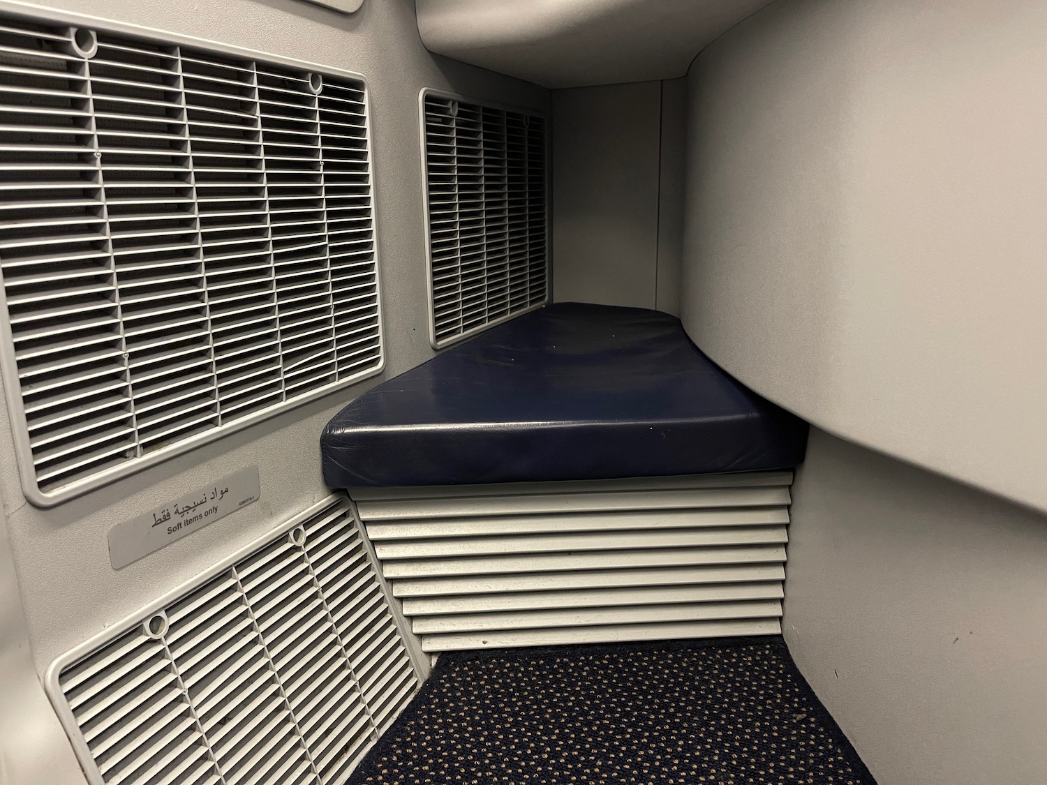 a seat in a room with vent