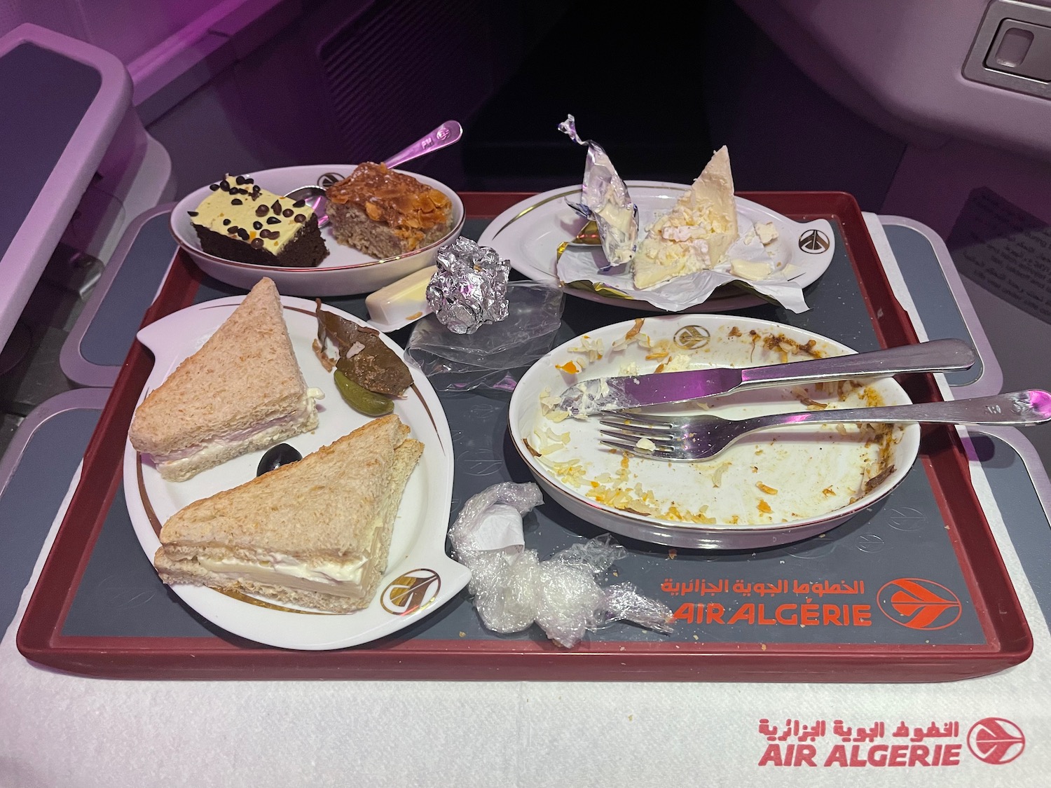 a tray of food on a plane