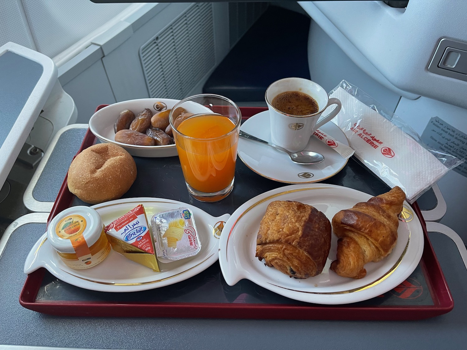 a tray of food on a plane