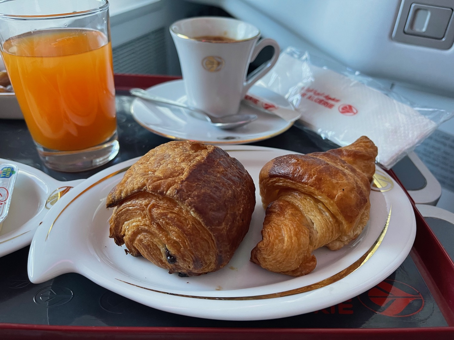 a plate of pastries and a cup of coffee
