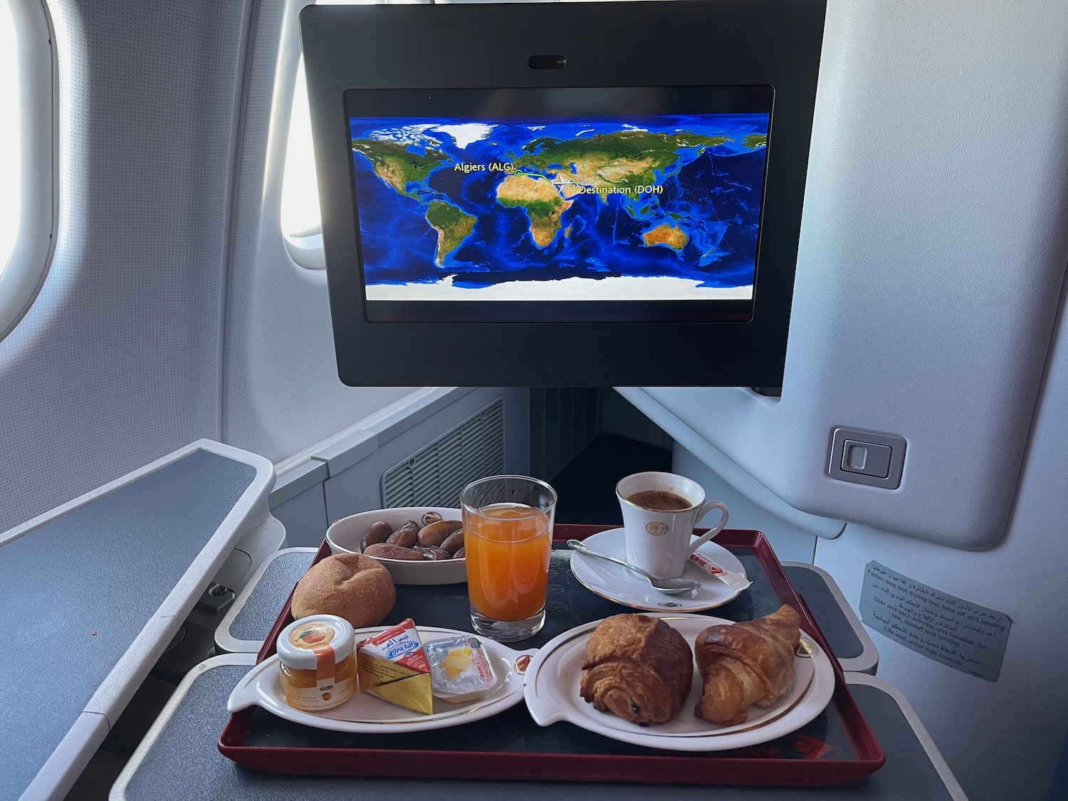 a tray of food on a tray with a television on the side