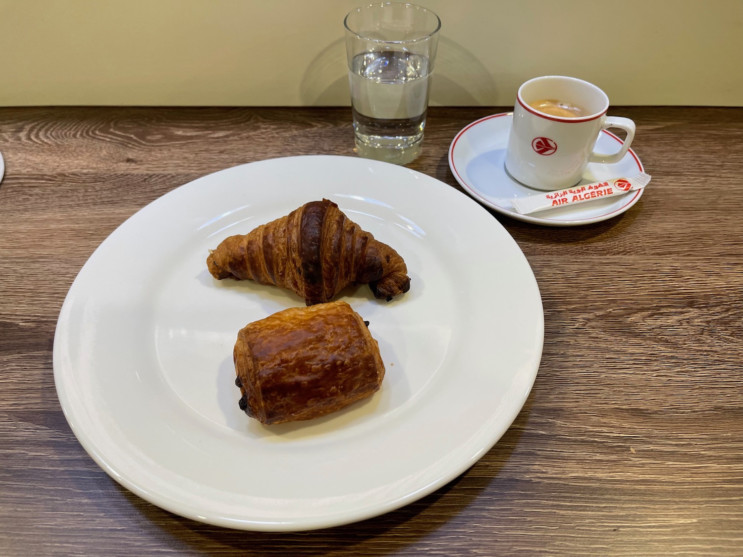 a plate of food and a cup of coffee