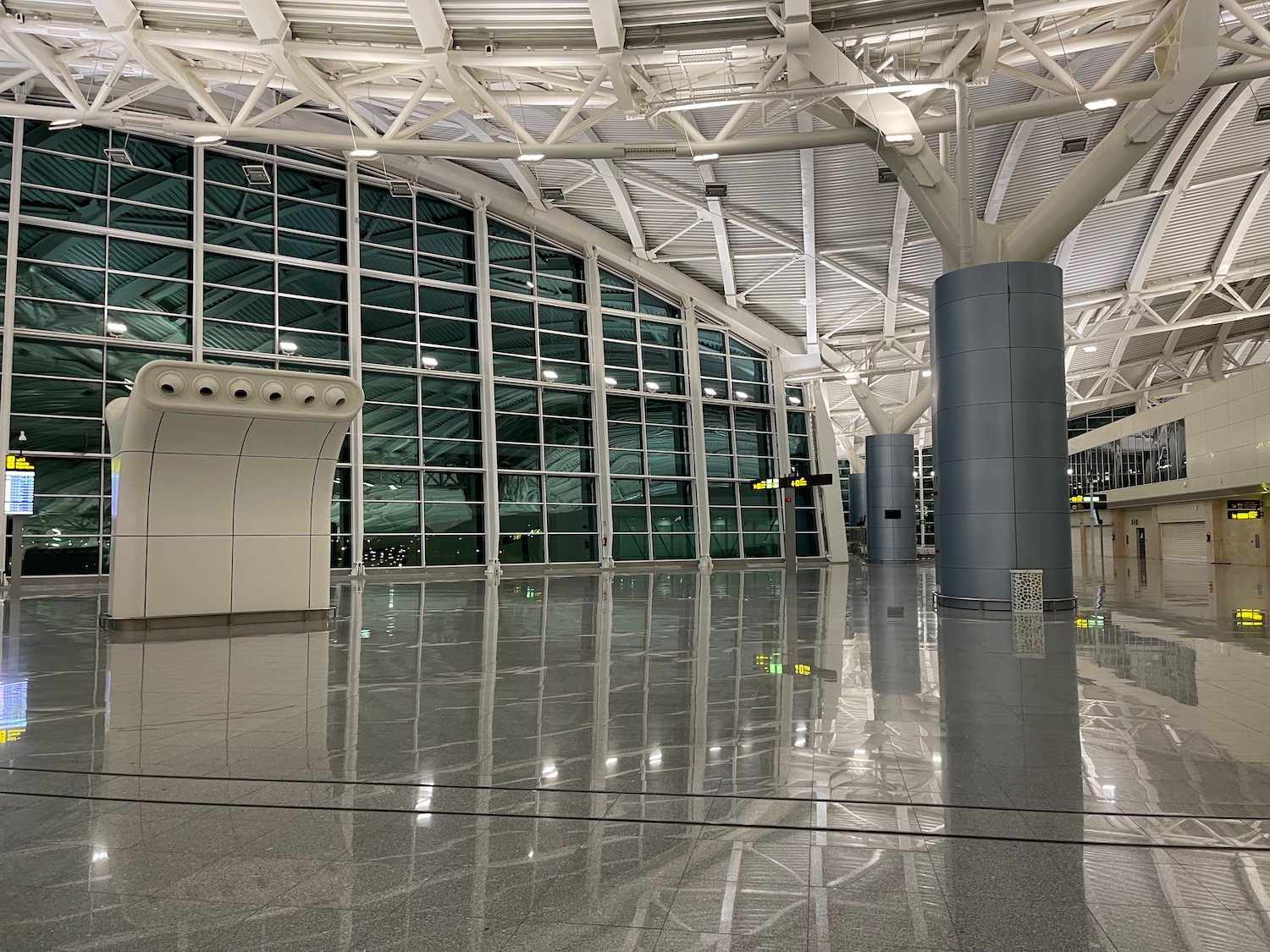 a large glass building with a large ceiling