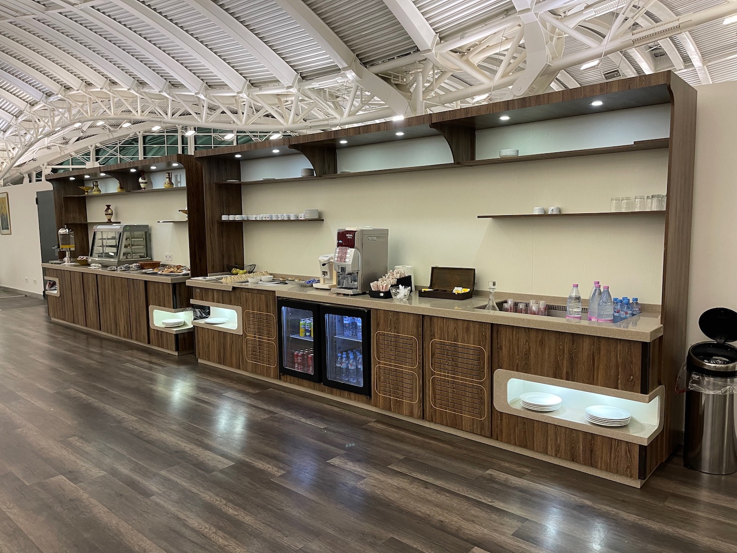 a food court with a wood floor and a wood floor