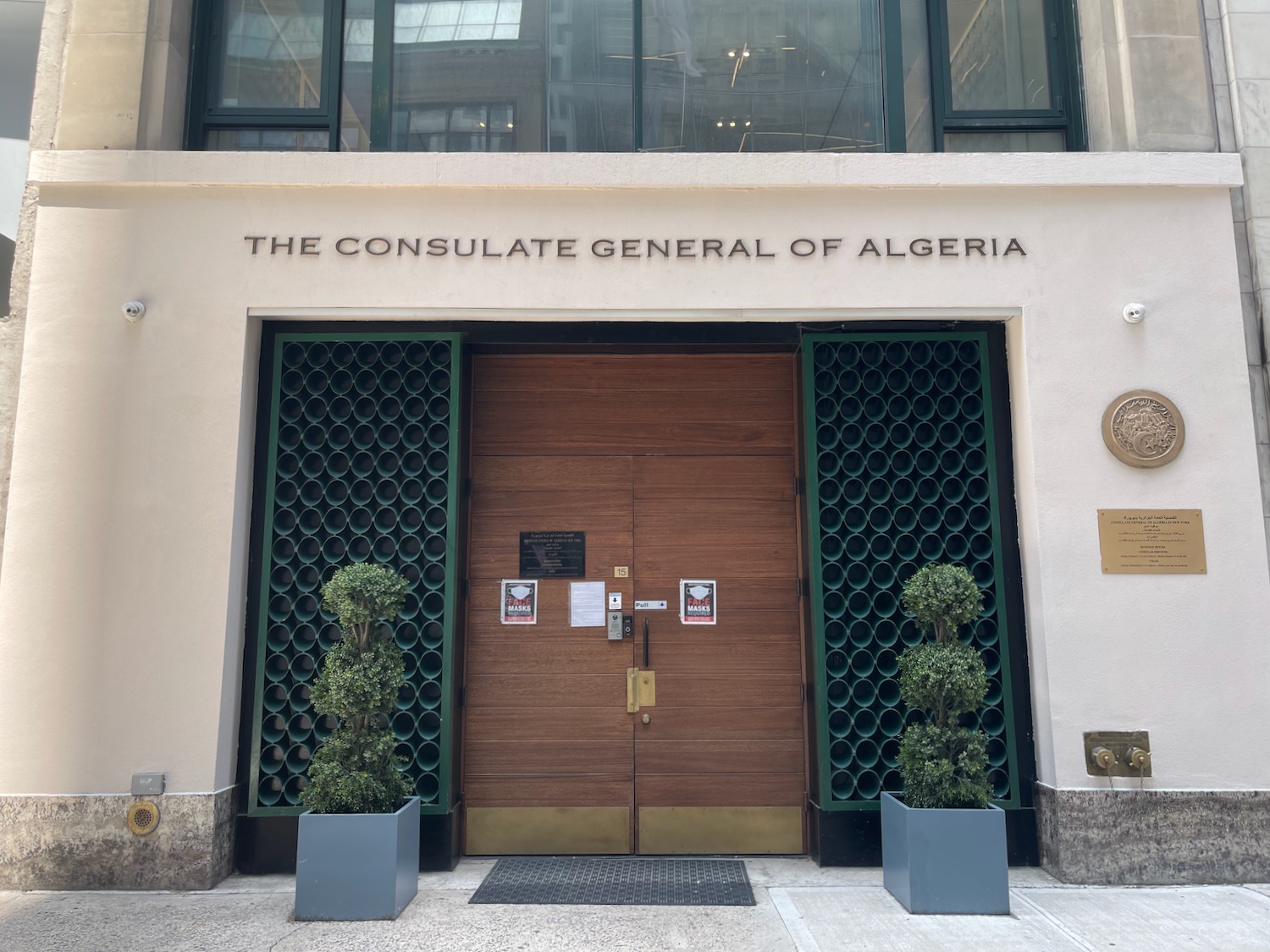 a building with a door and a sign