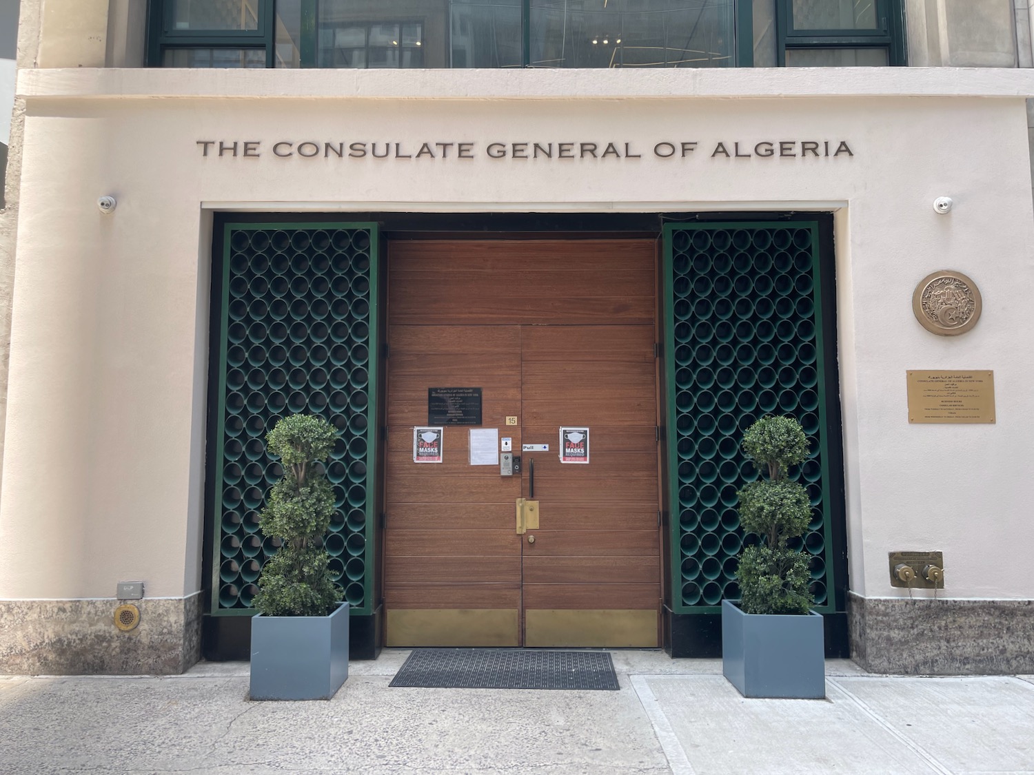 a building with a door and a sign