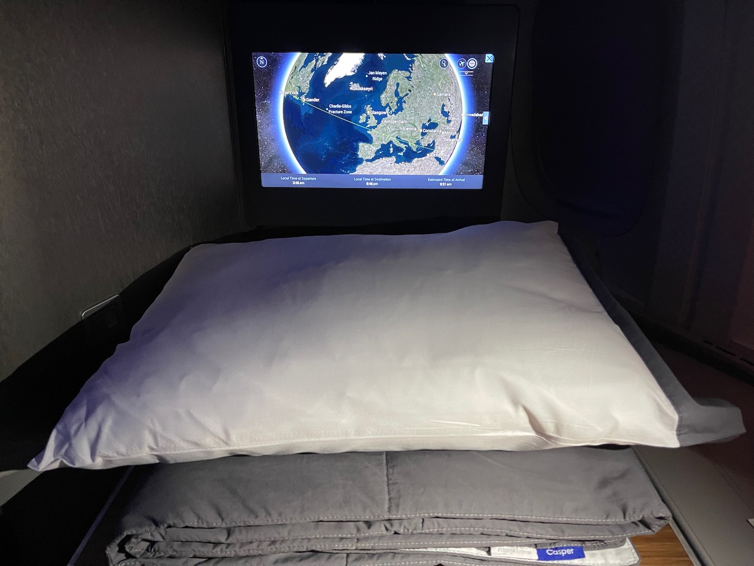 a bed with a screen on it