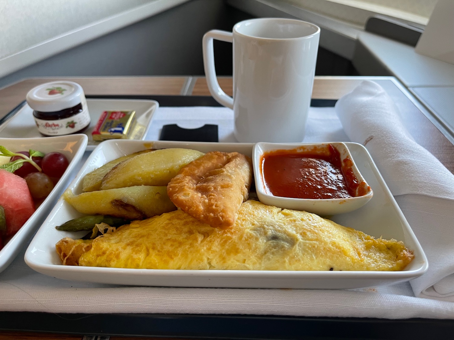 a plate of food on a tray