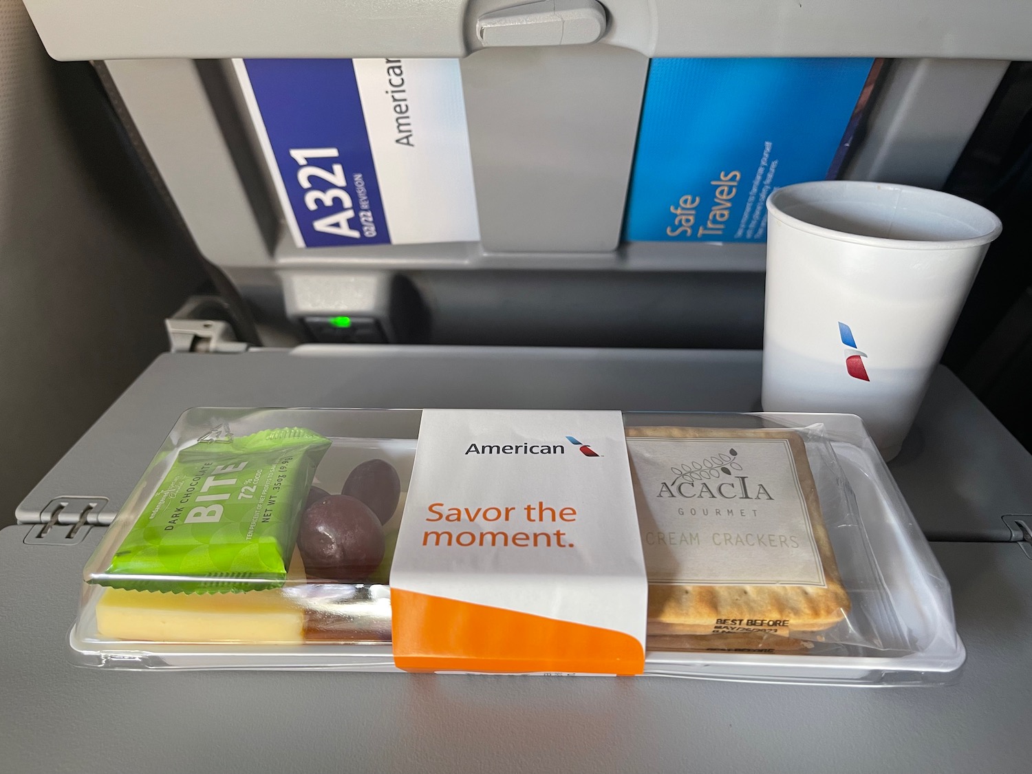 a food in a plastic container on a plane