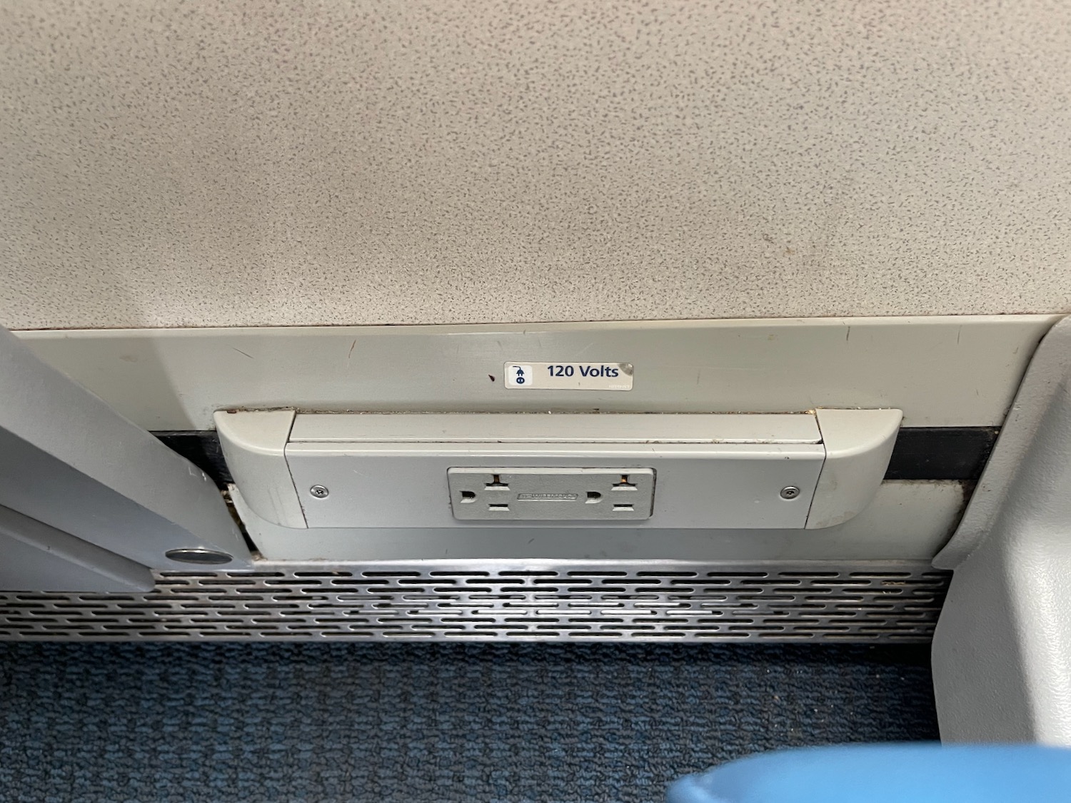 an electrical outlet on a plane