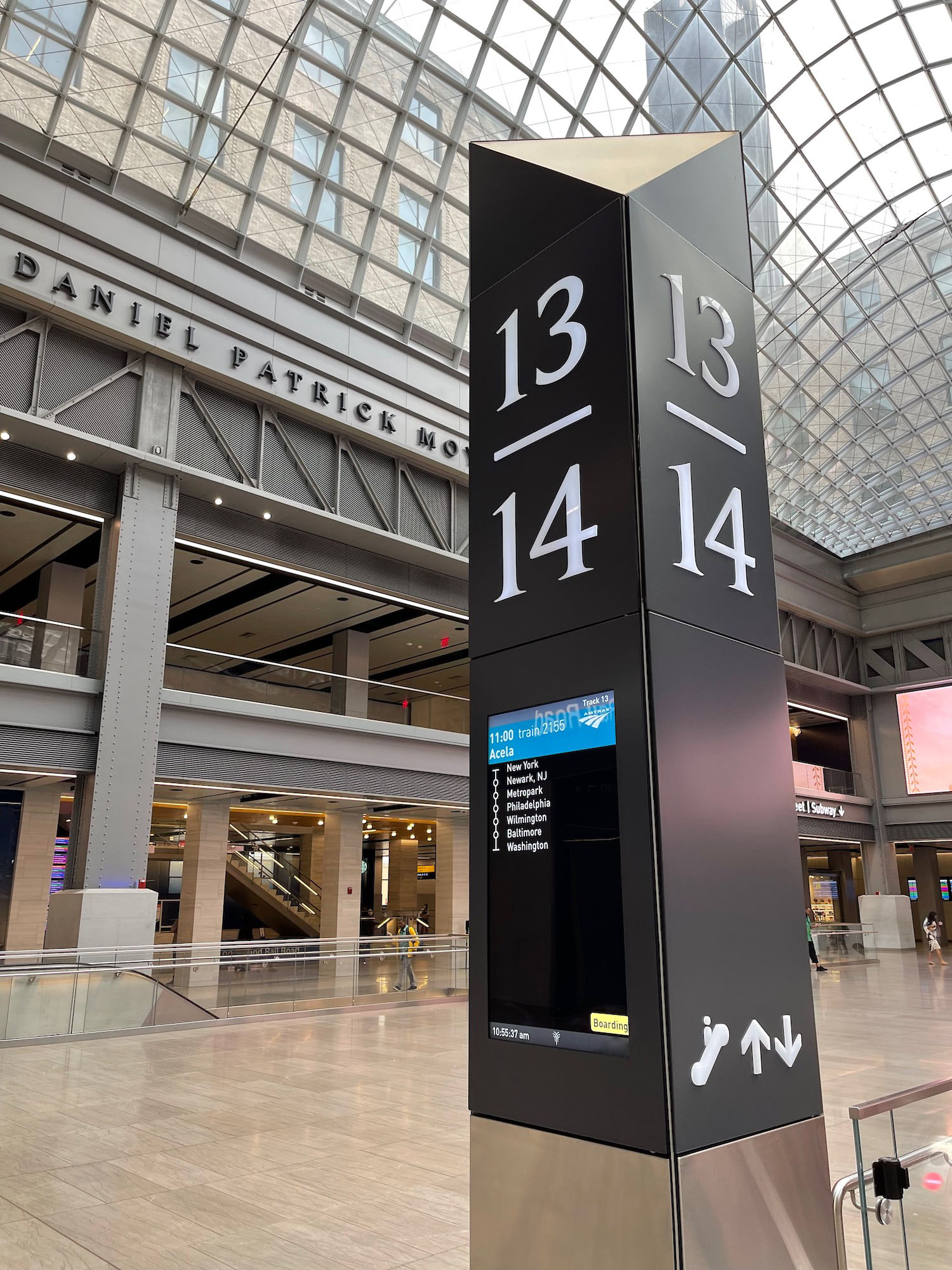 a black sign in a mall