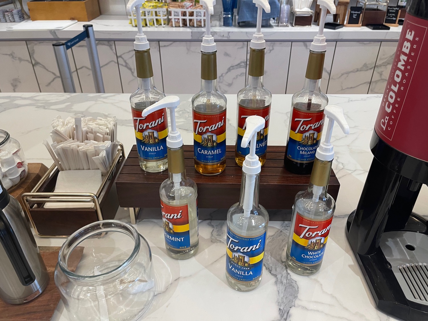 a group of bottles of liquid on a counter
