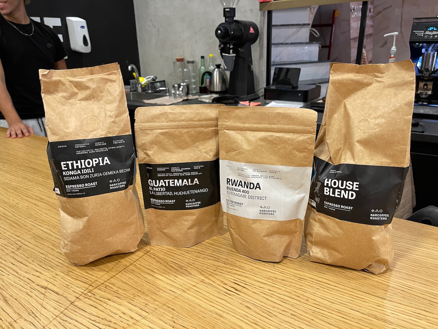 a group of brown bags with black labels