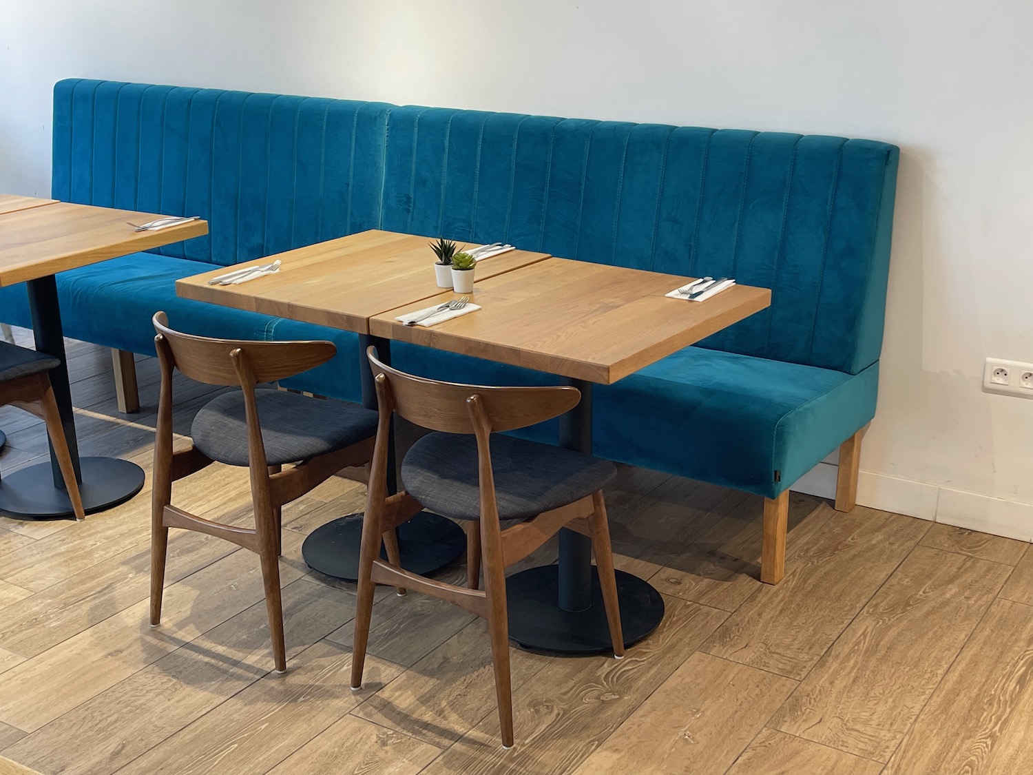 a table with a blue booth