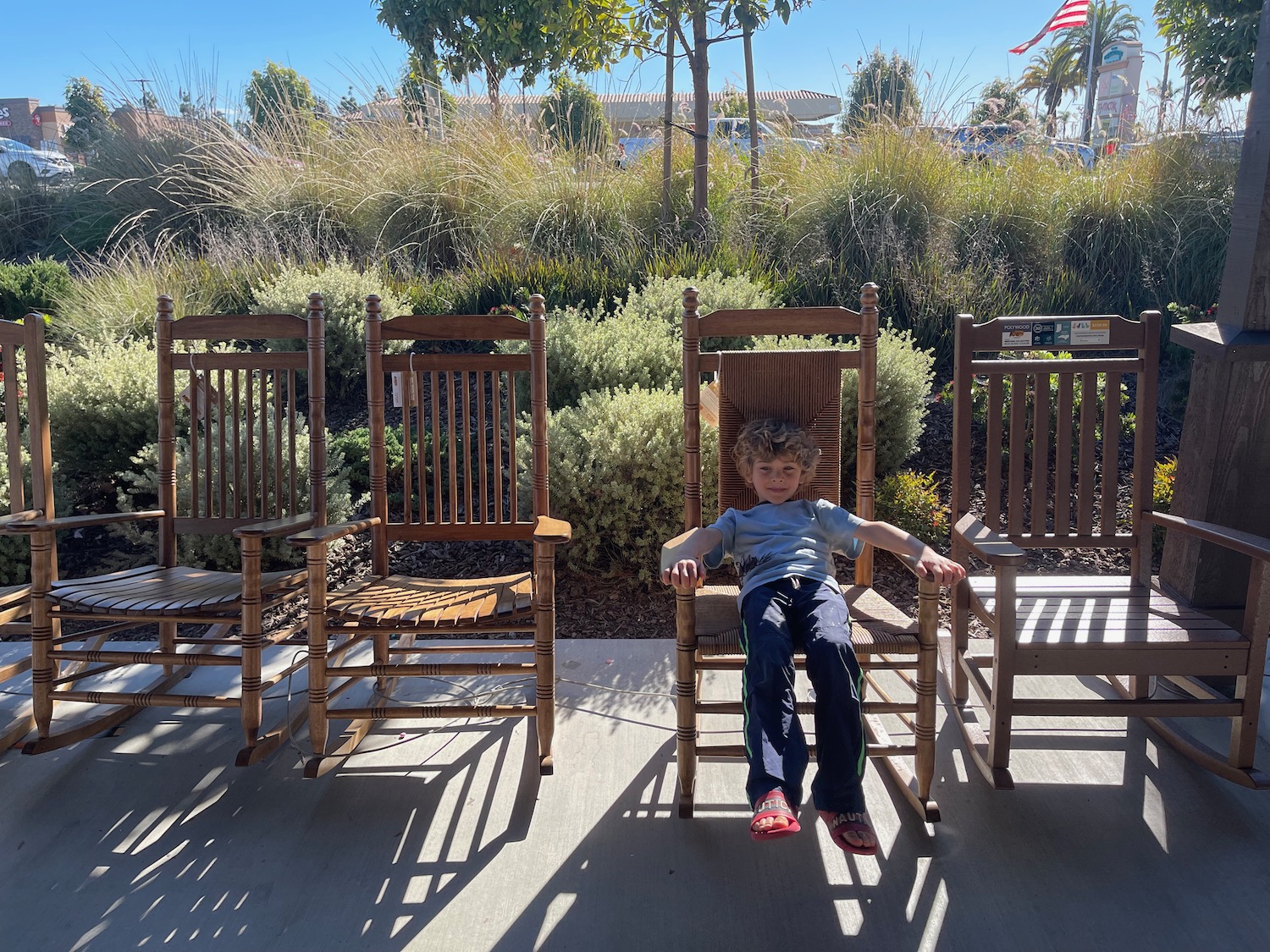 a boy sitting in a chair