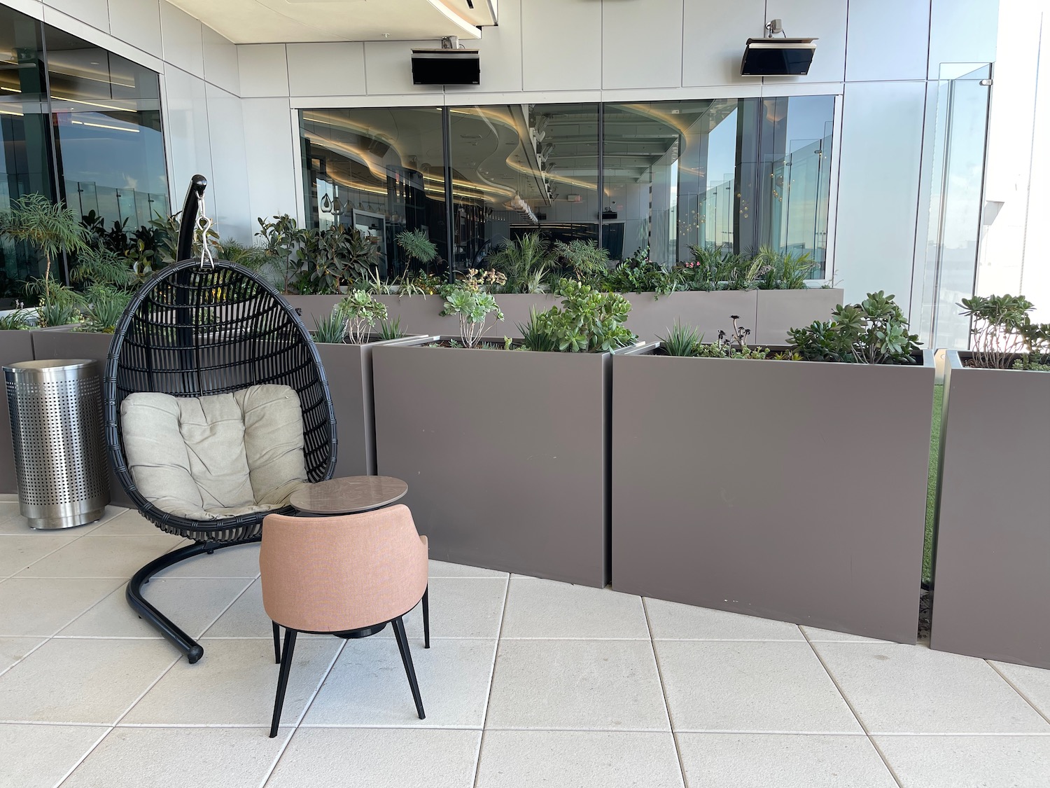 a chair and a table outside of a building