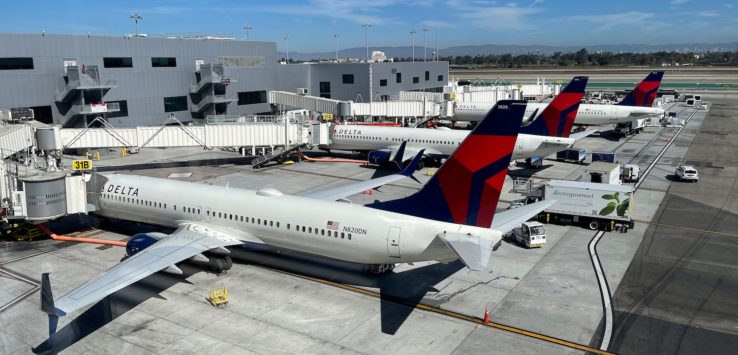 airplanes parked at an airport