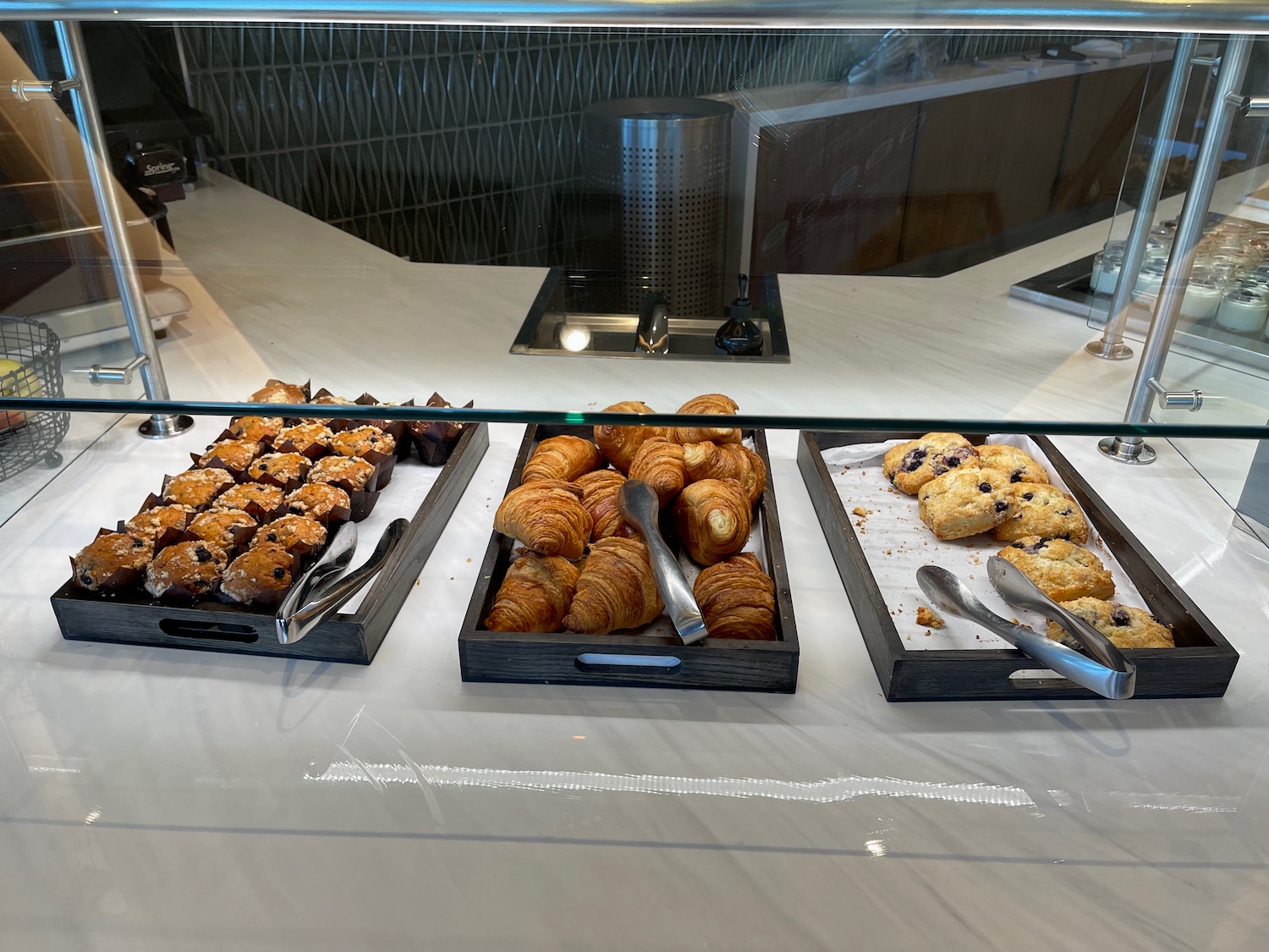 a trays of pastries on a counter