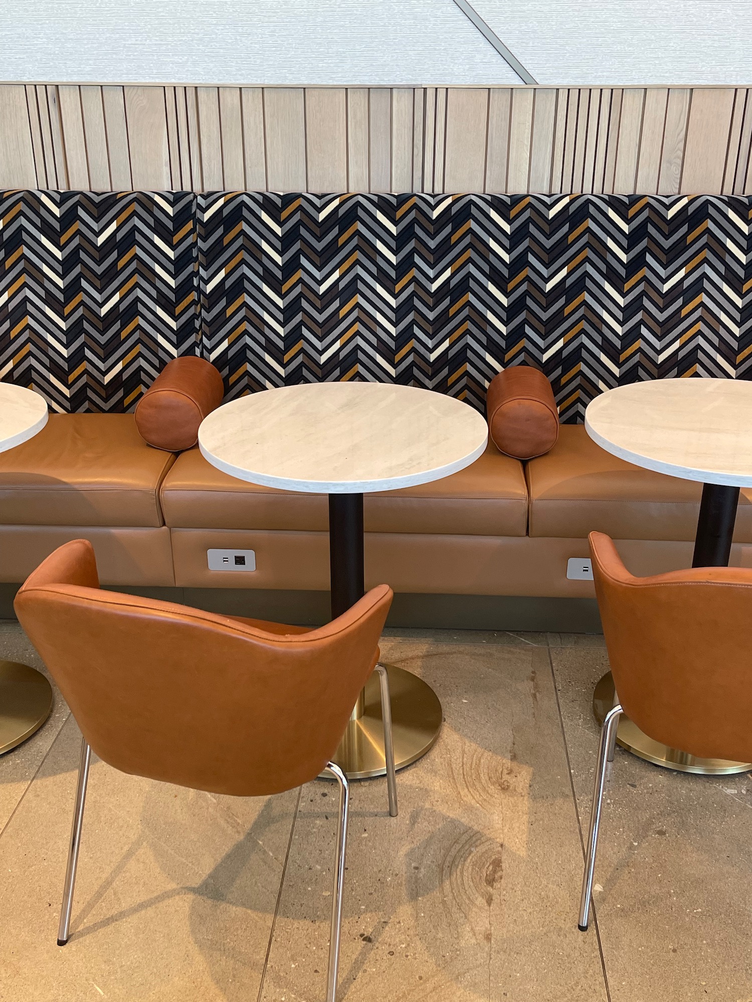 a group of tables and chairs in a room