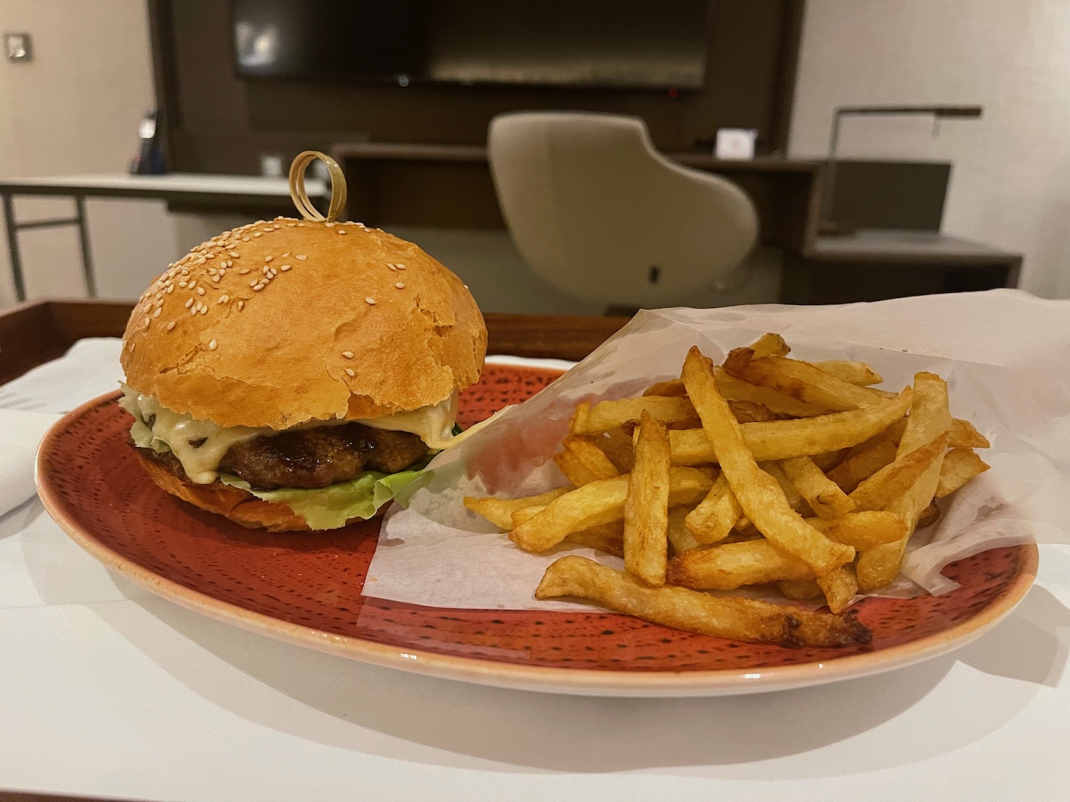 a burger and fries on a plate