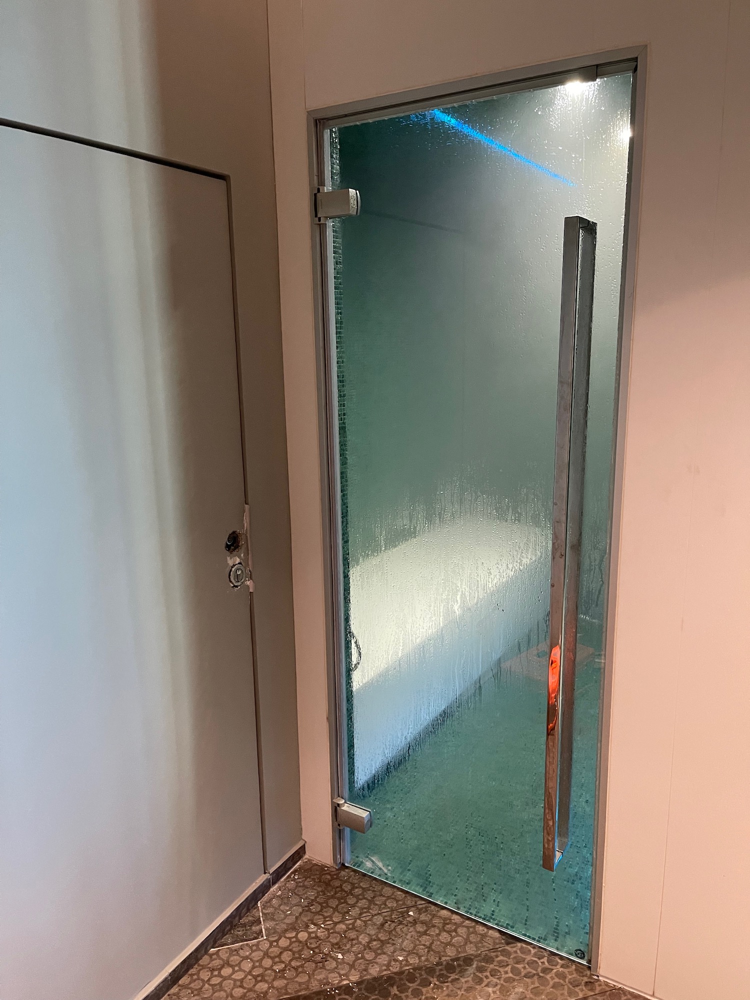 a glass door with a handle