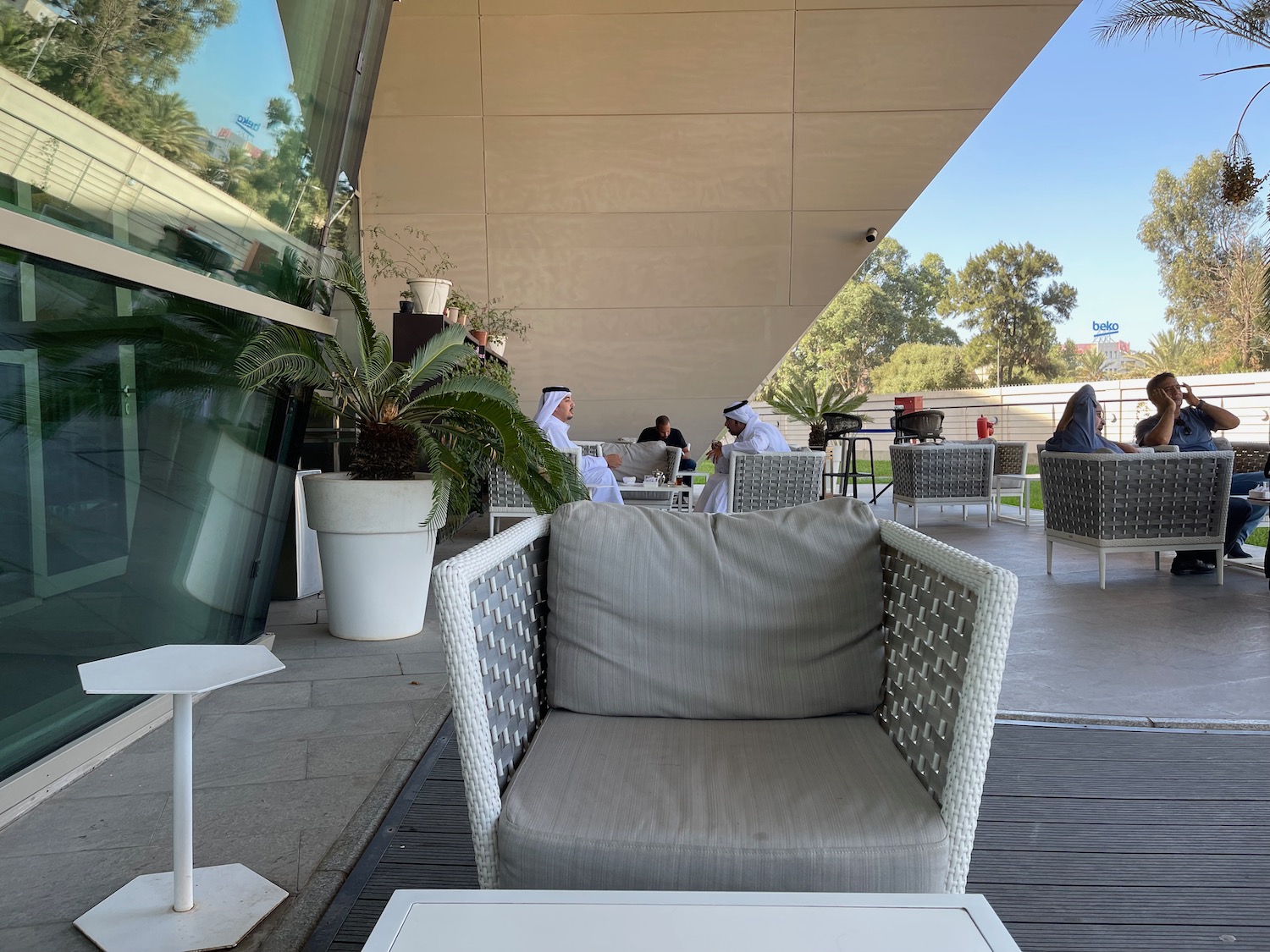 a chair and table outside of a building