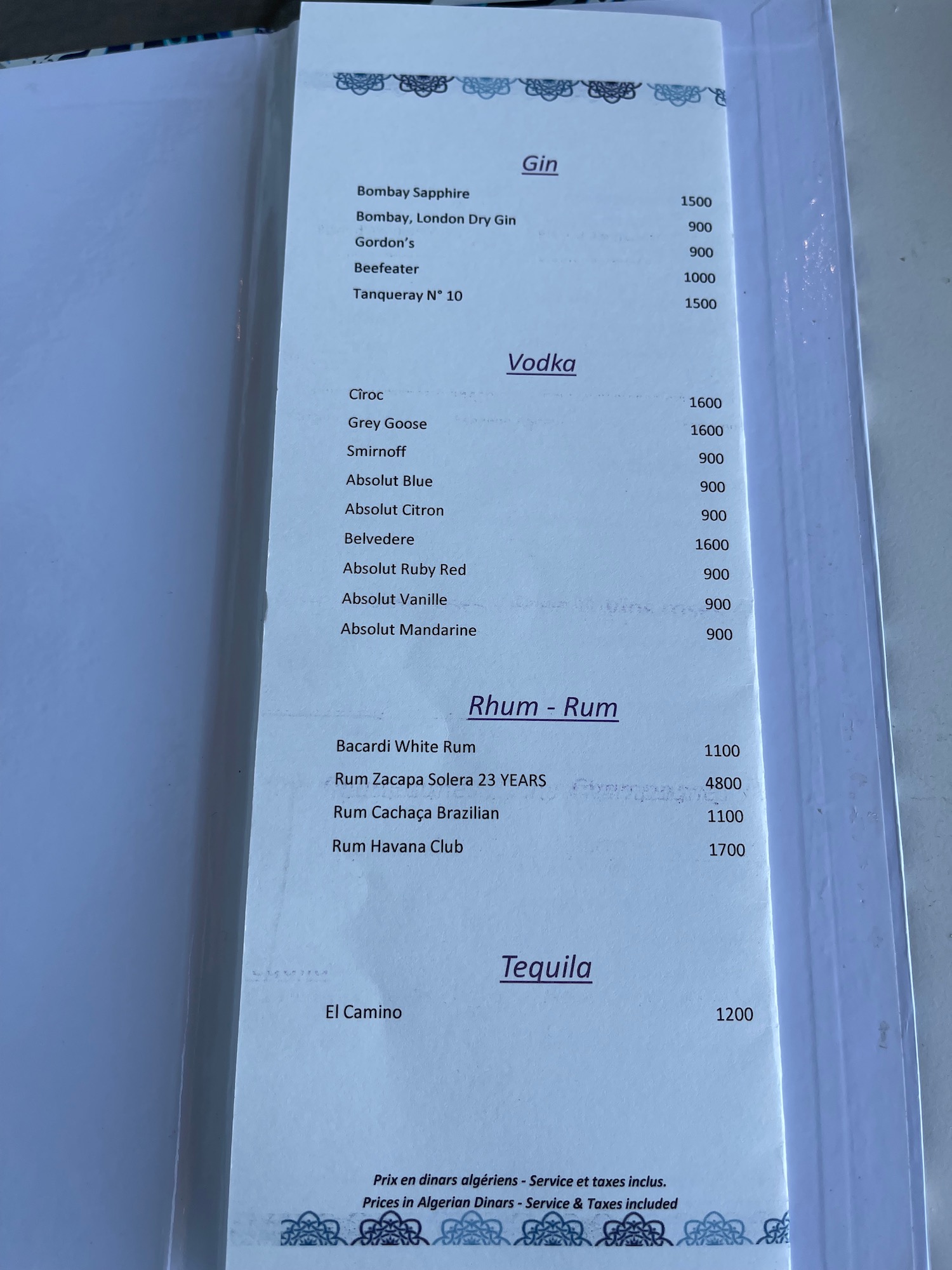 a menu on a white surface