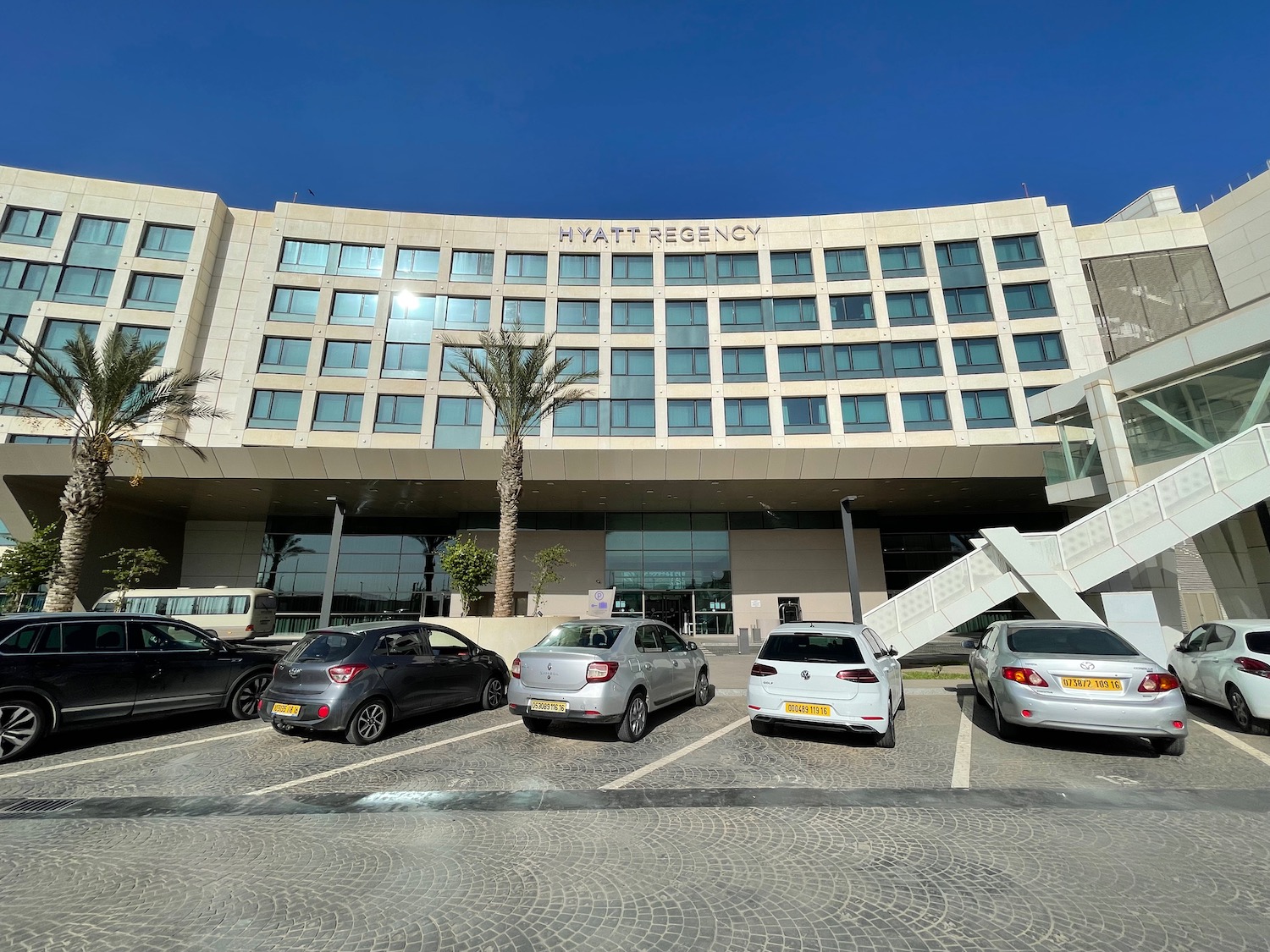 a building with cars parked in front of it