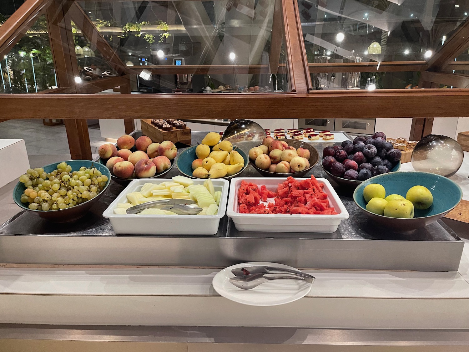 a group of bowls of fruit