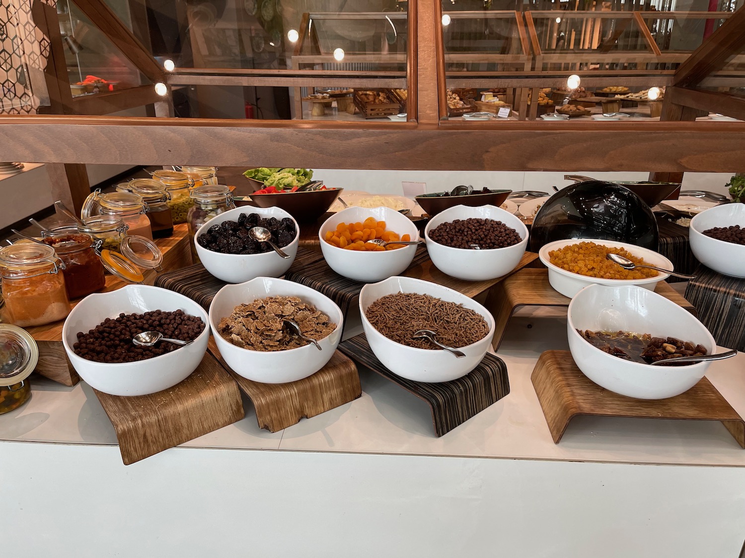 a table with bowls of cereal and other food