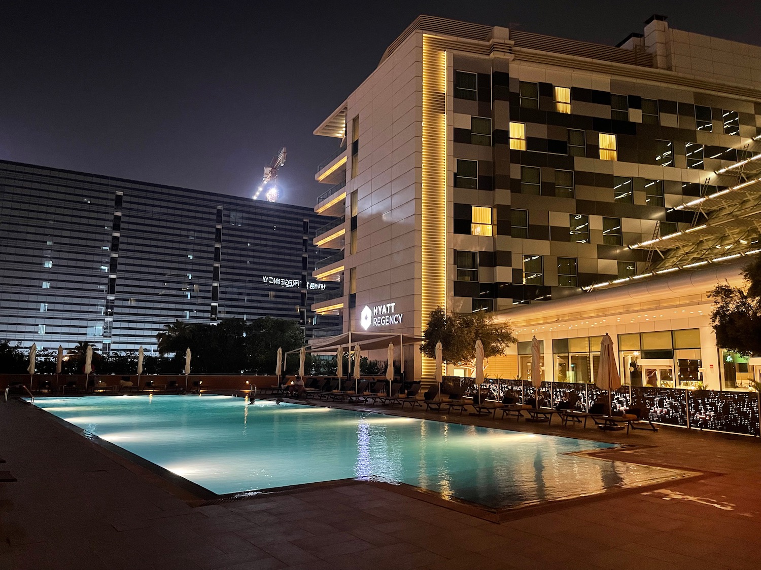 a pool in front of a building