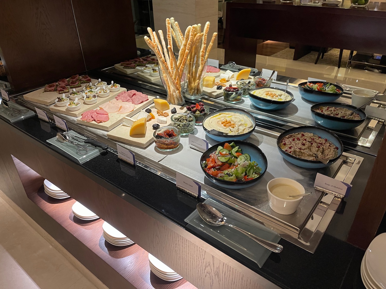 a buffet table with different food on it