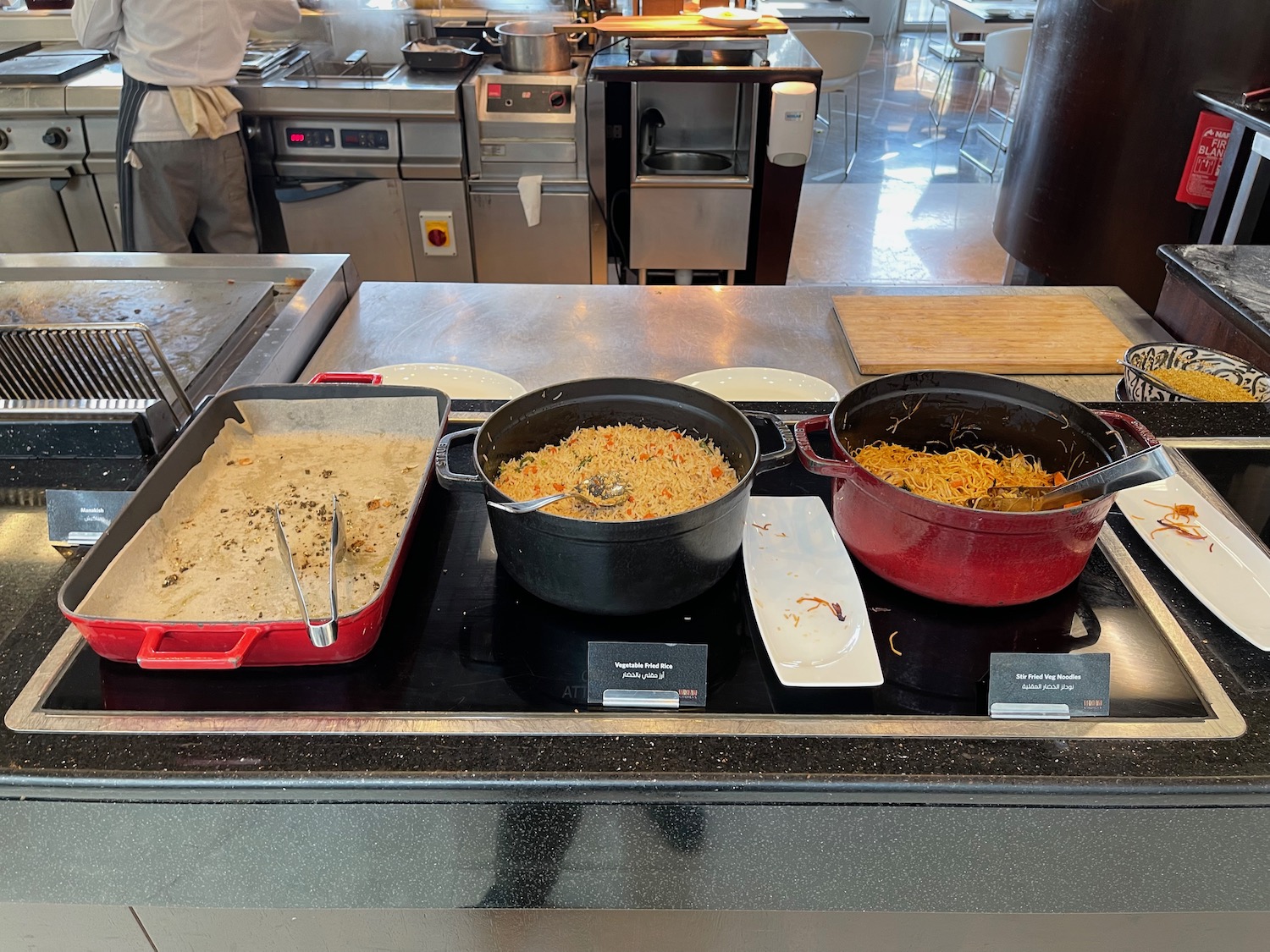 a group of food in pots on a counter