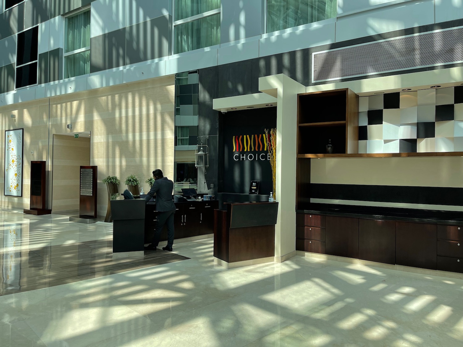 a man standing at a counter in a building