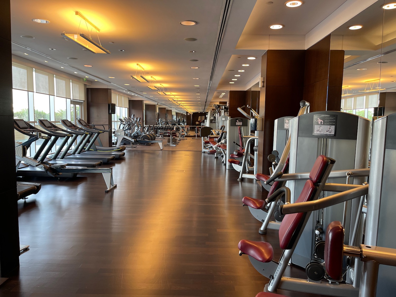 a large room with exercise equipment