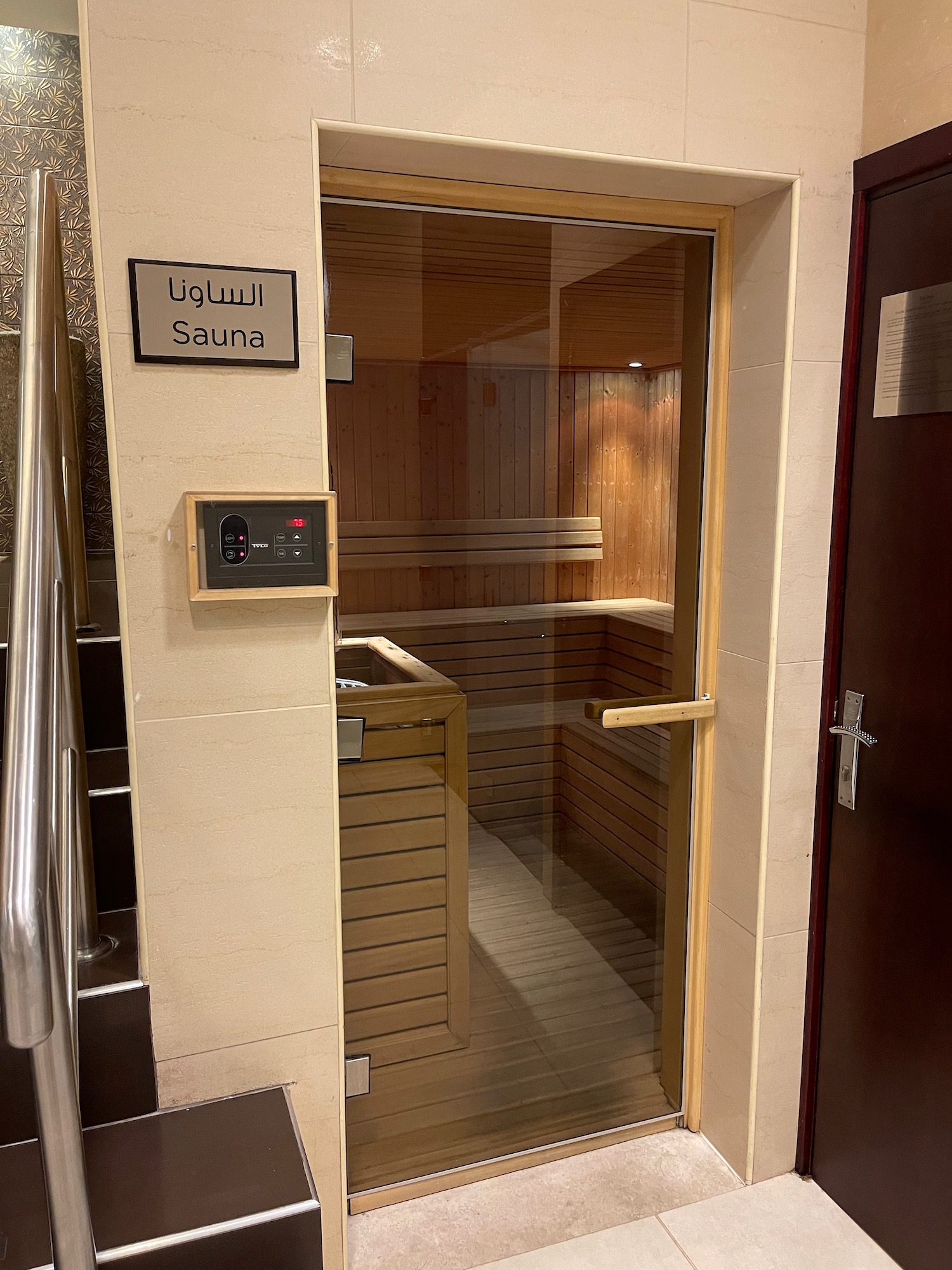 a glass door of a sauna