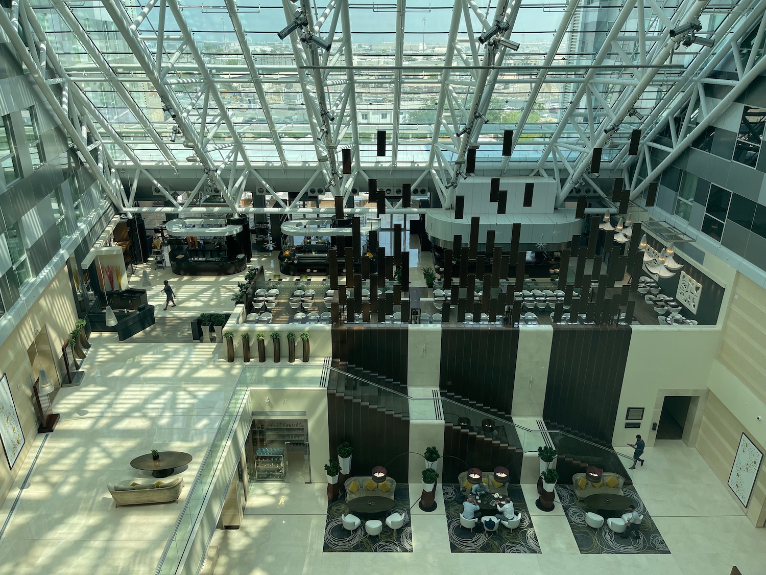 a large building with glass ceiling and a large window