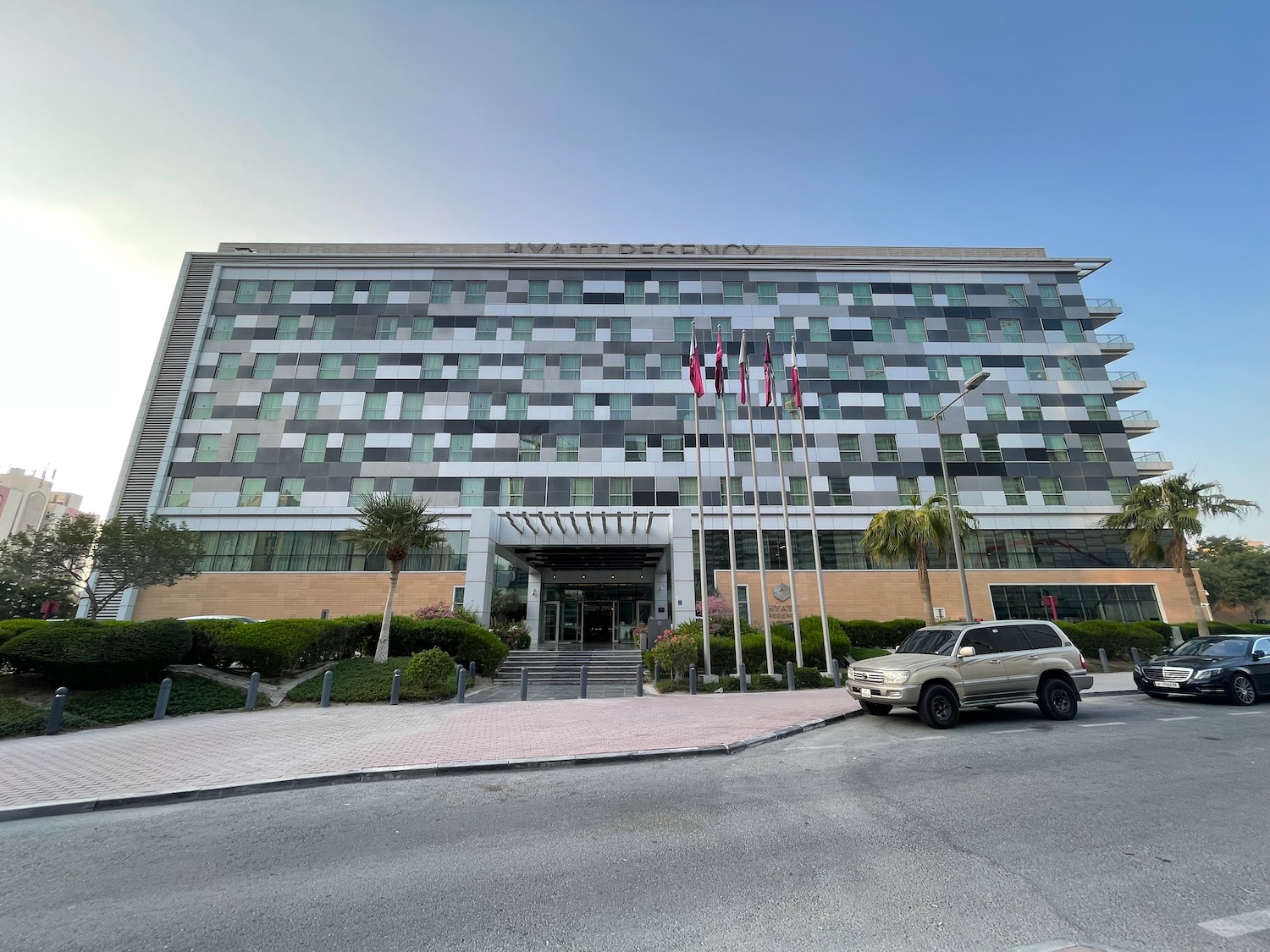 a building with flags in front of it