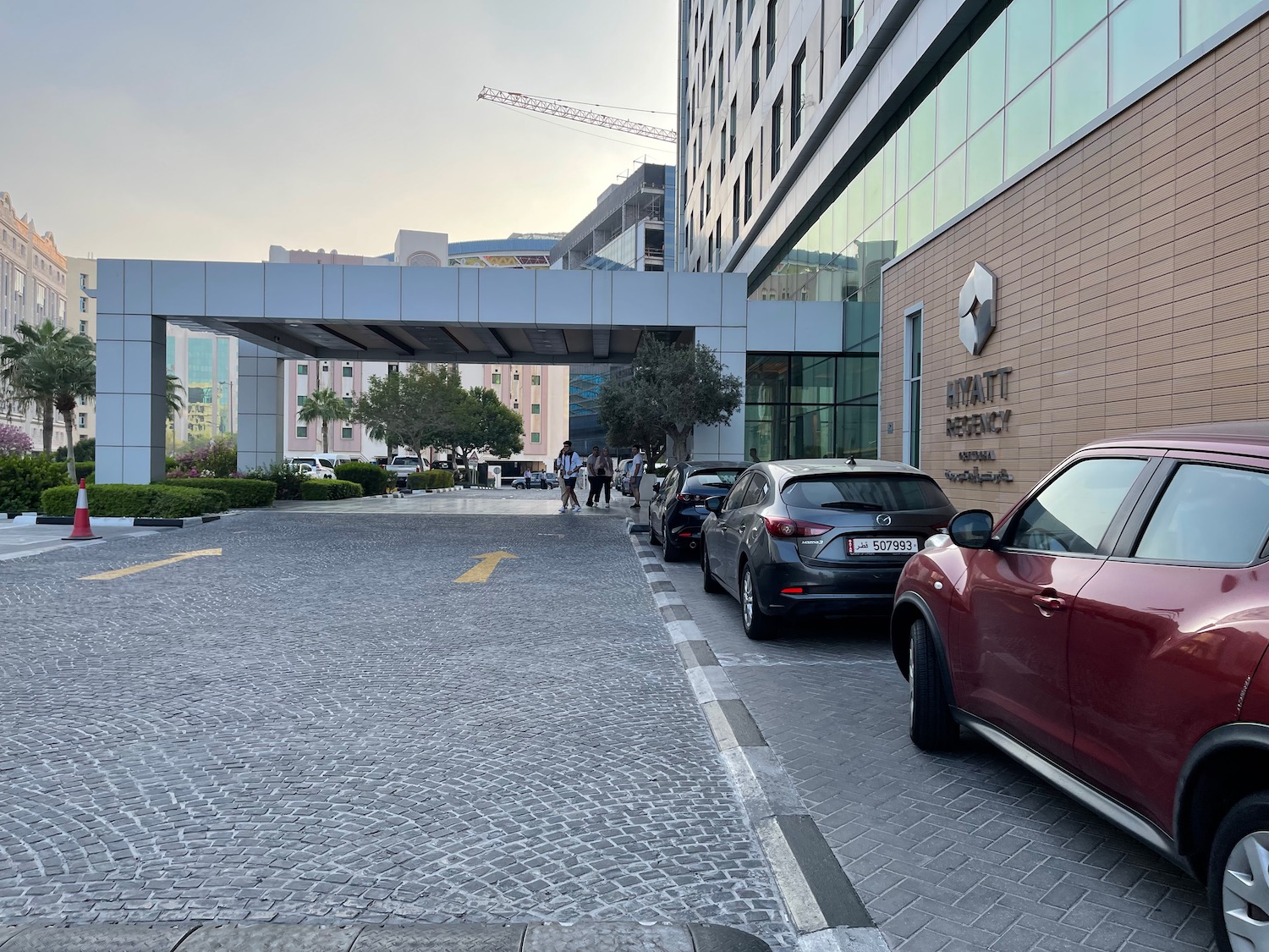 cars parked cars in front of a building