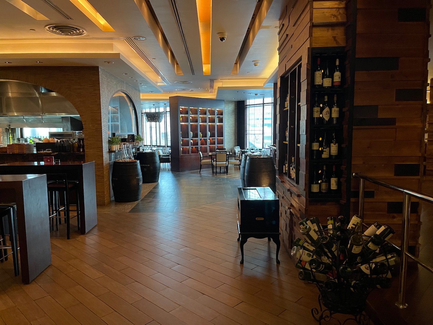 a room with a wine rack and wine bottles