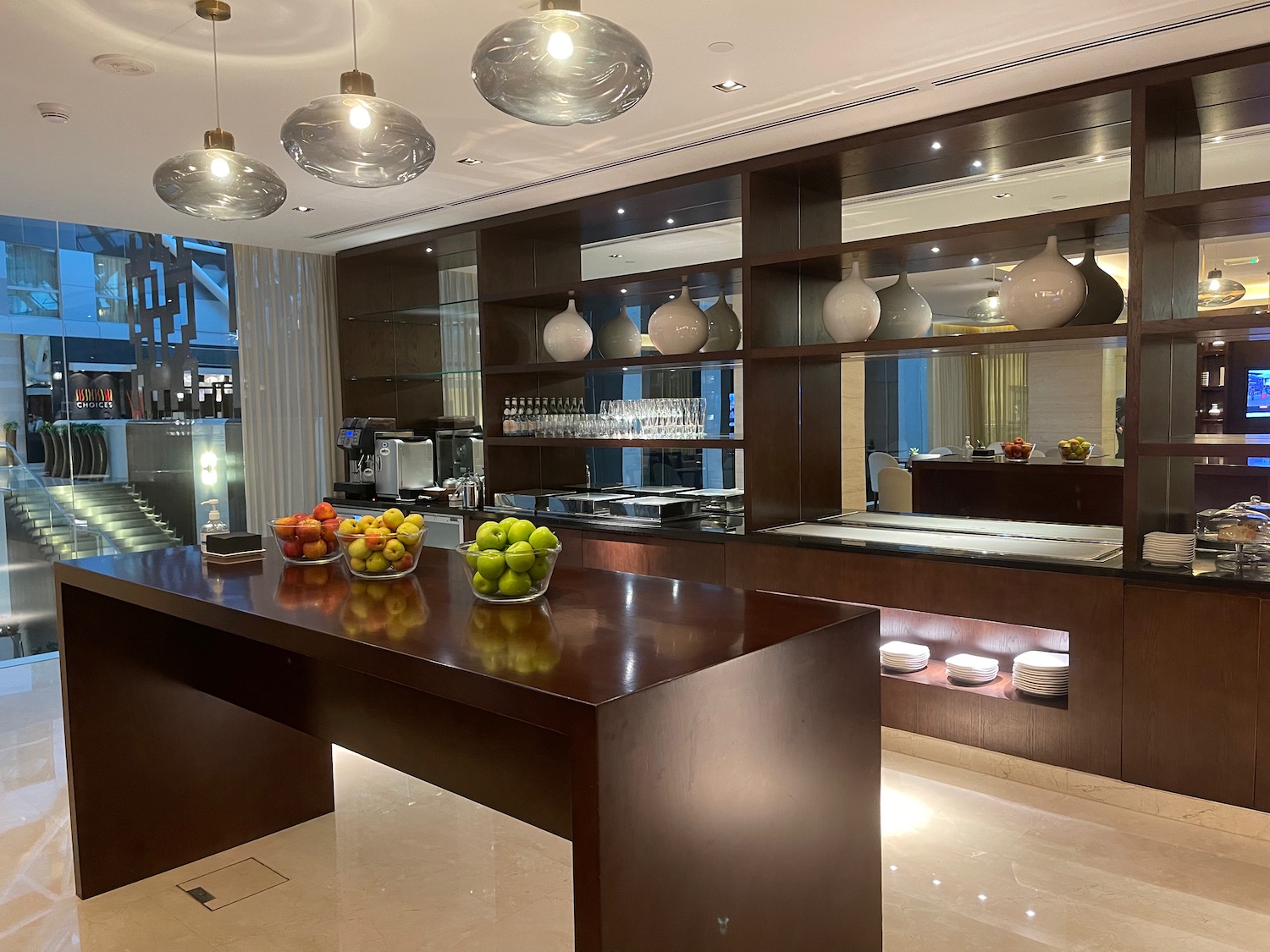 a kitchen with a counter and fruit