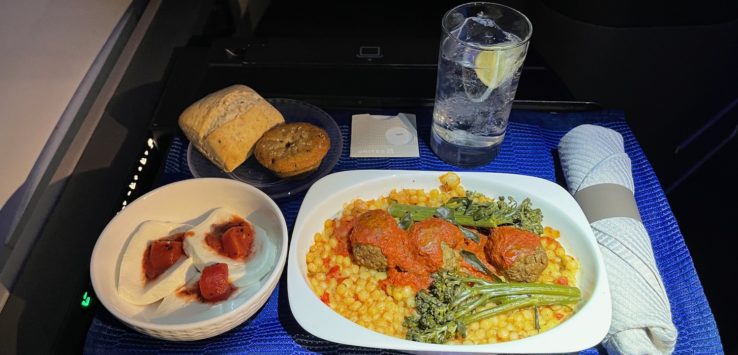 a plate of food on a tray