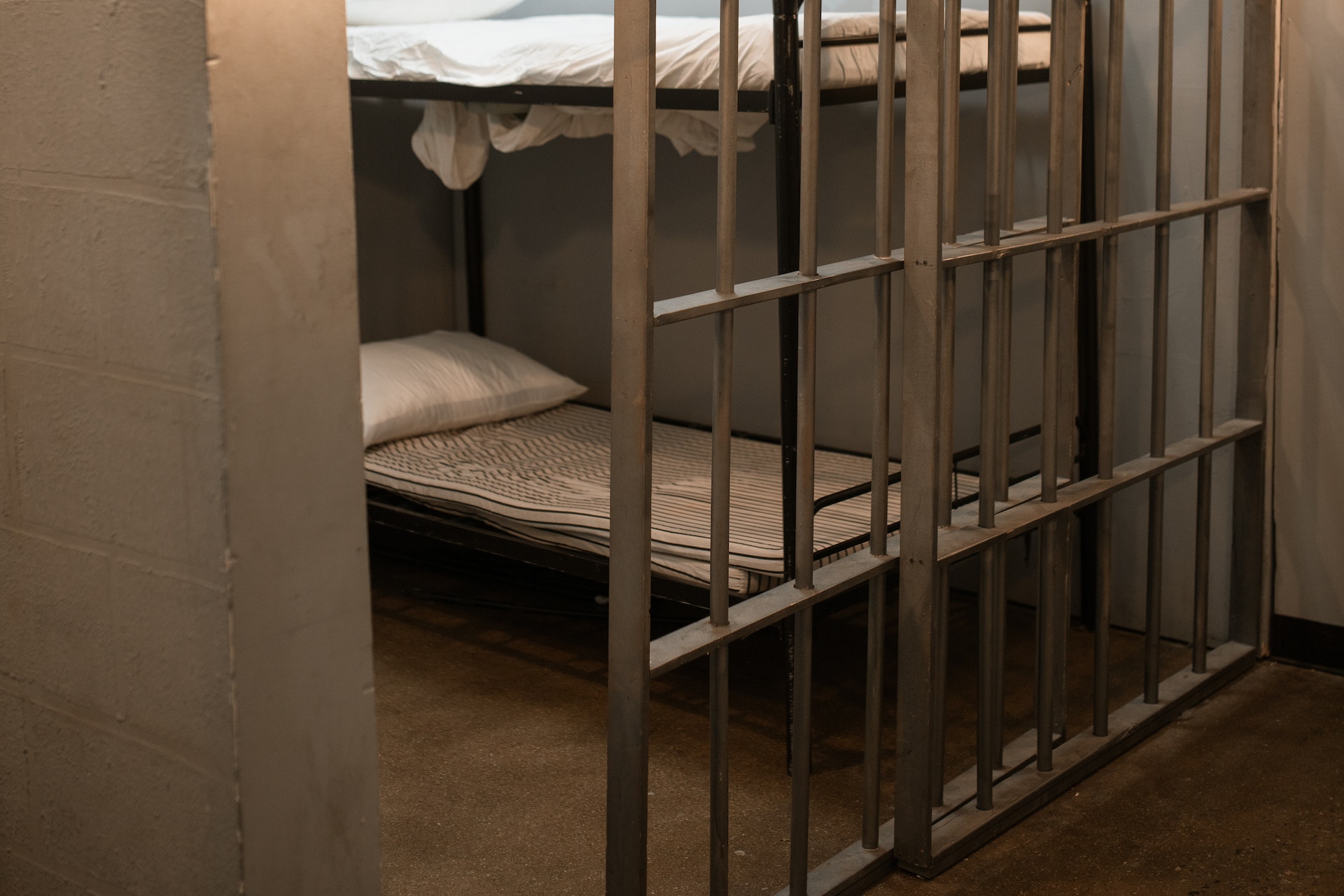 a bunk bed in a jail cell