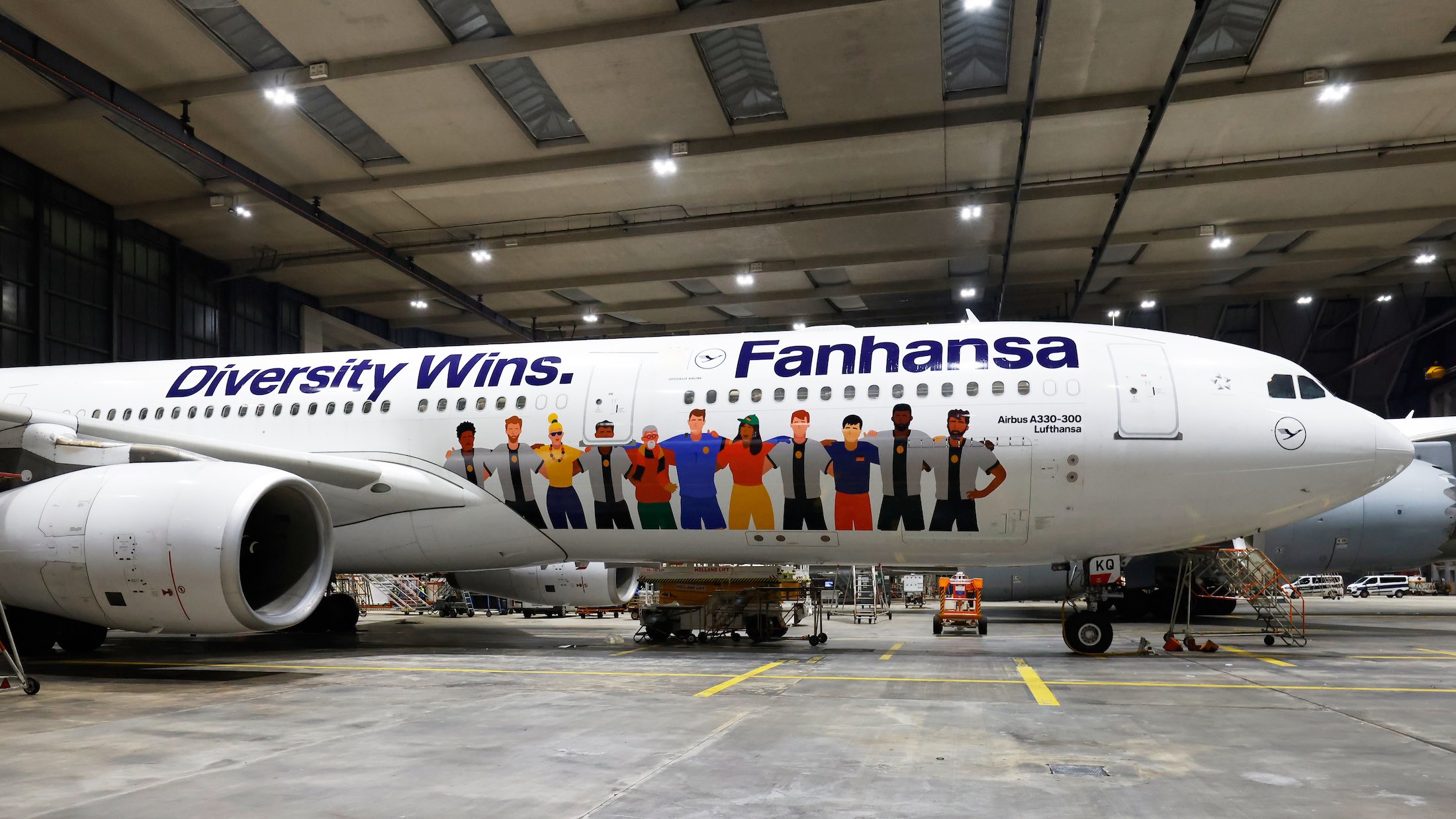 a large airplane with cartoon characters on the side